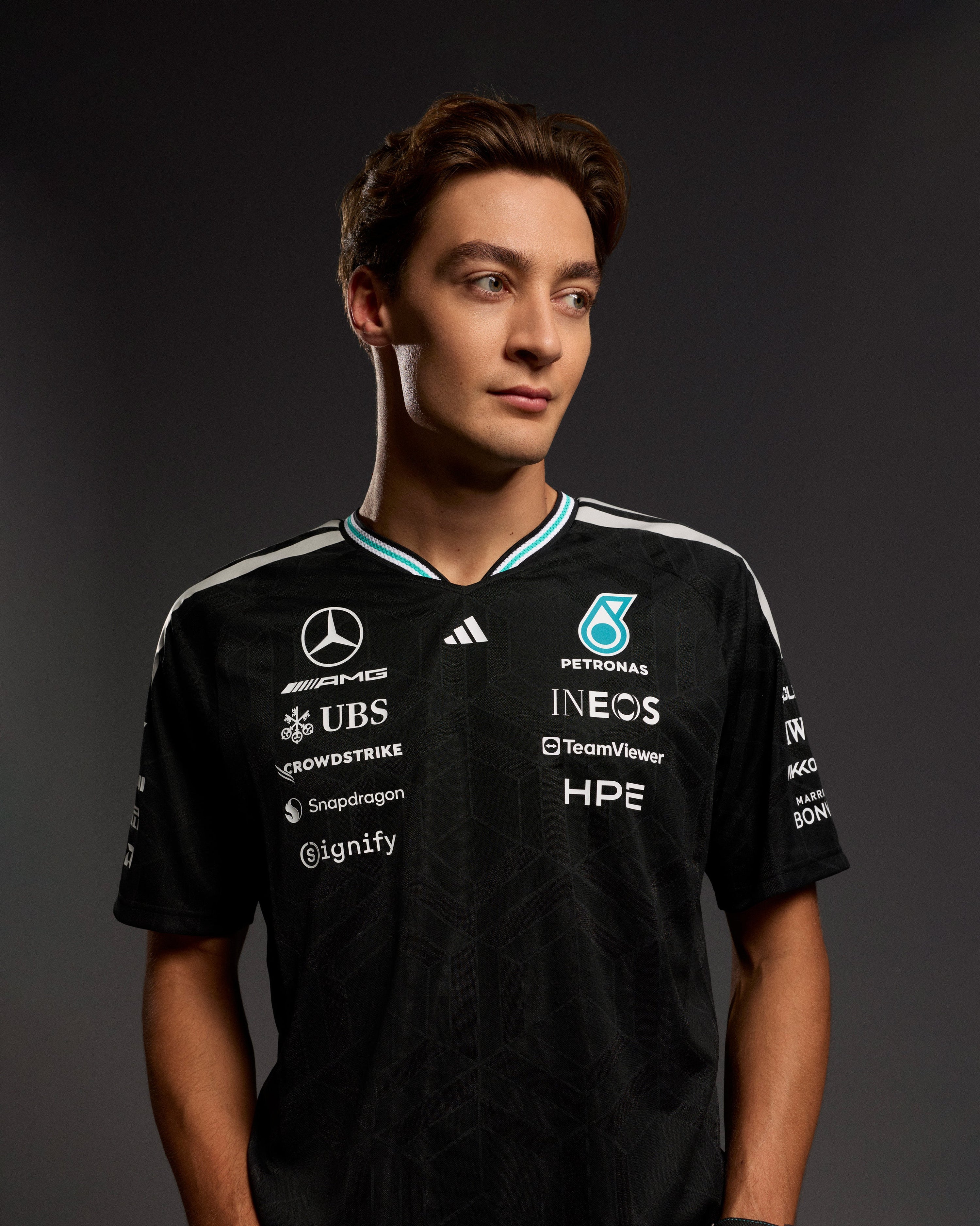 Mens 2026 Authentic Driver Tee Black — primary product view showing Mercedes-AMG PETRONAS F1 styling and product details | Dash Racegear