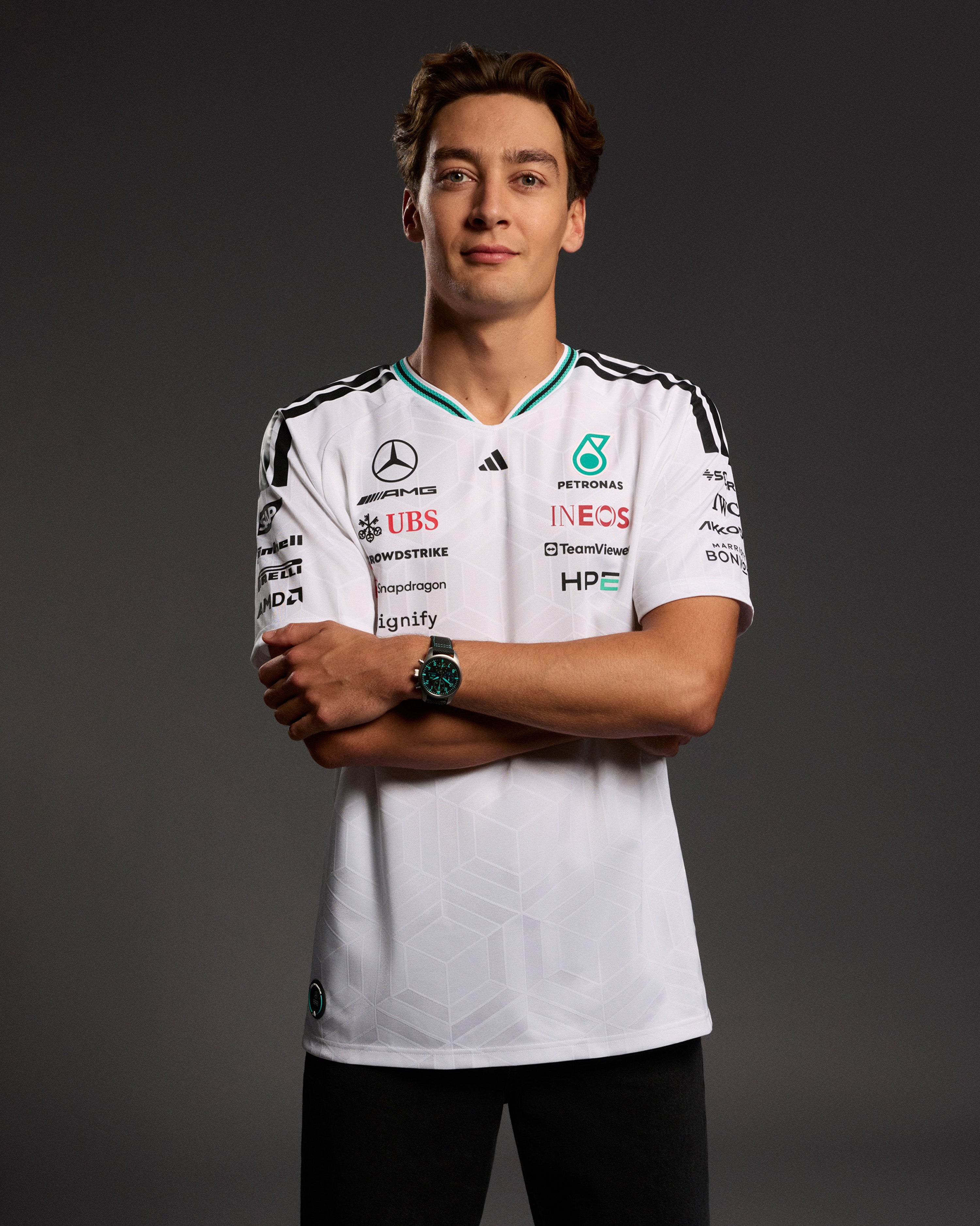 Mens 2026 Authentic Driver Tee White — primary product view showing Mercedes-AMG PETRONAS F1 styling and product details | Dash Racegear