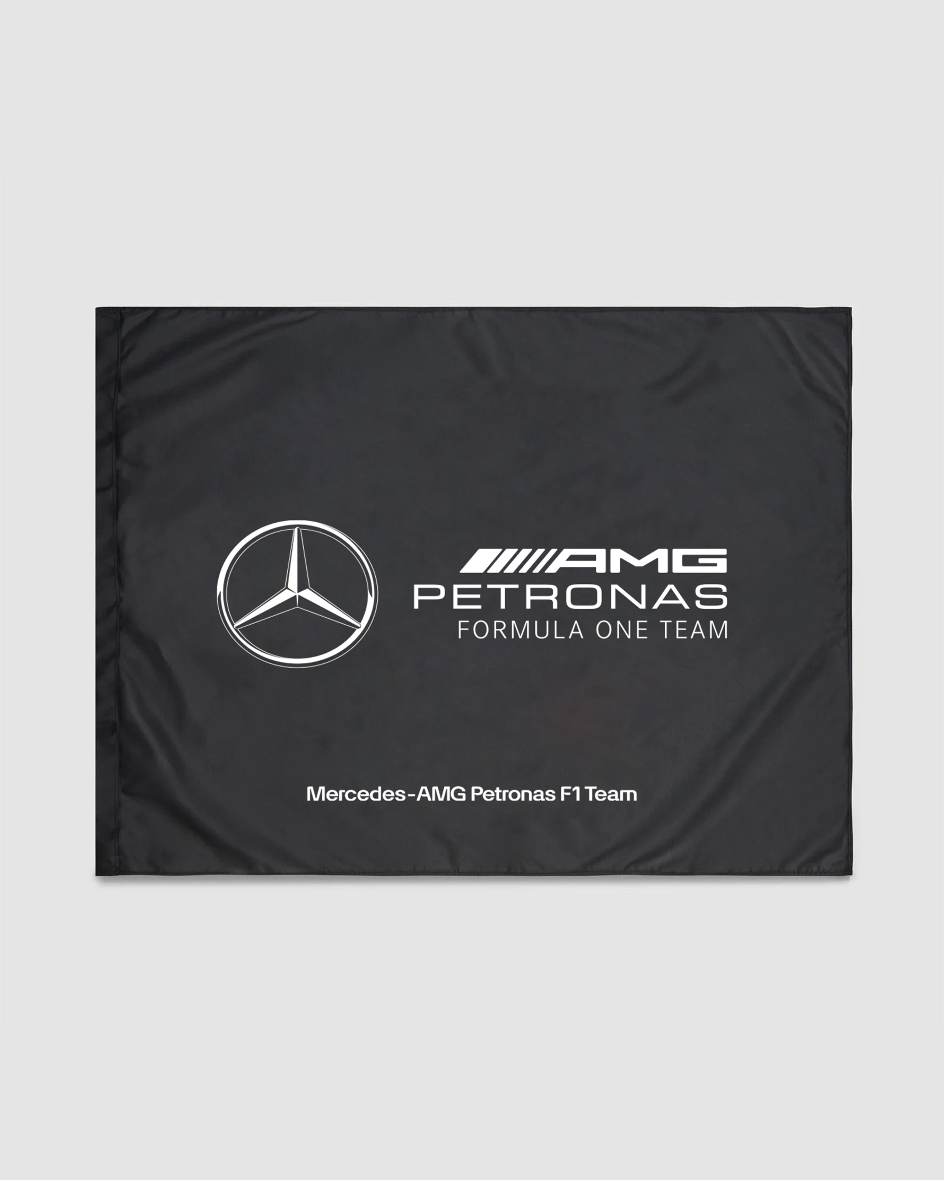 Team Flag Black — primary product view showing Mercedes-AMG PETRONAS F1 styling and product details | Dash Racegear