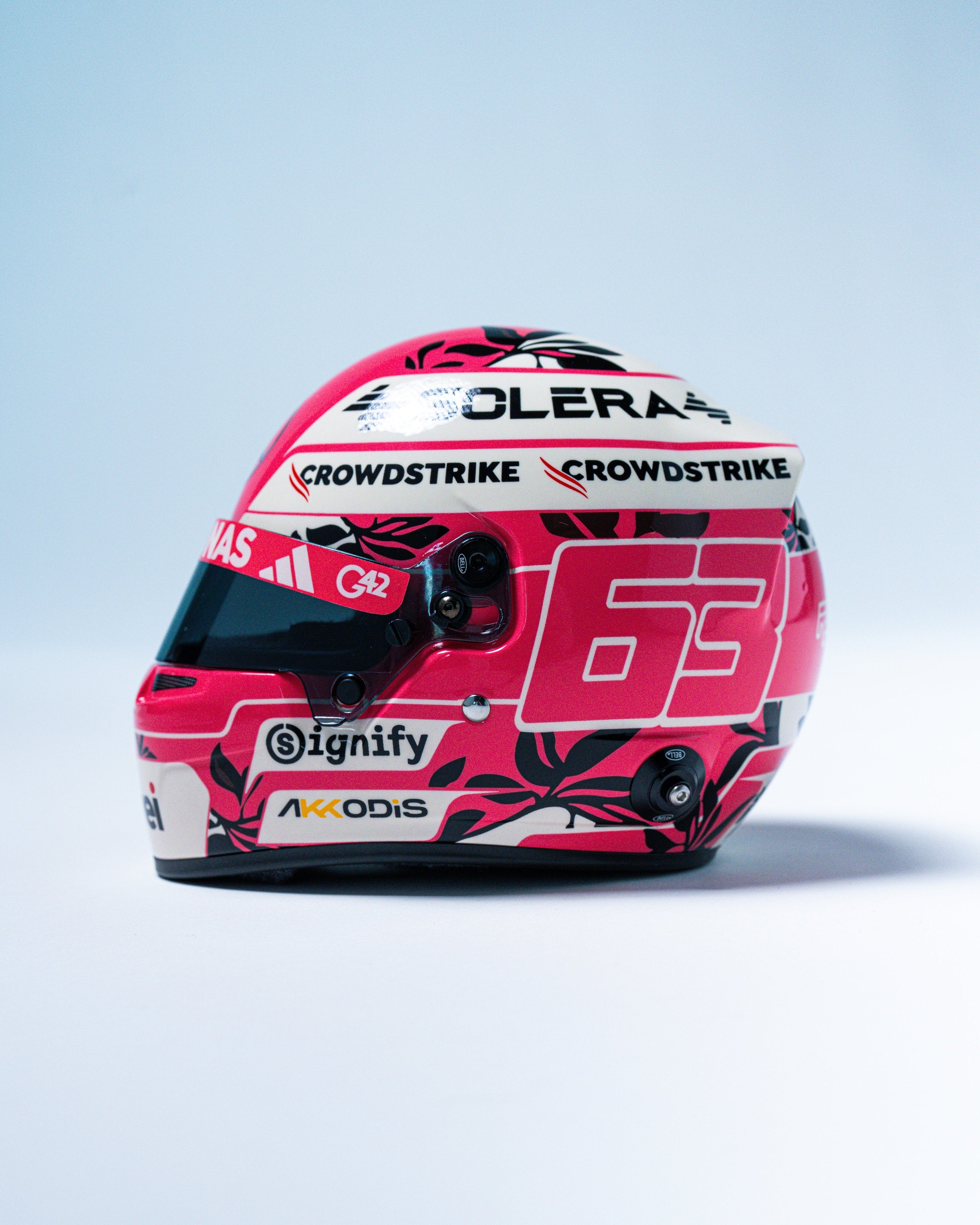 George Russell 2025 Miami Mini Bell Helmet Replica 1:2 — alternate product angle showing Mercedes-AMG PETRONAS F1 styling and product details | Dash Racegear