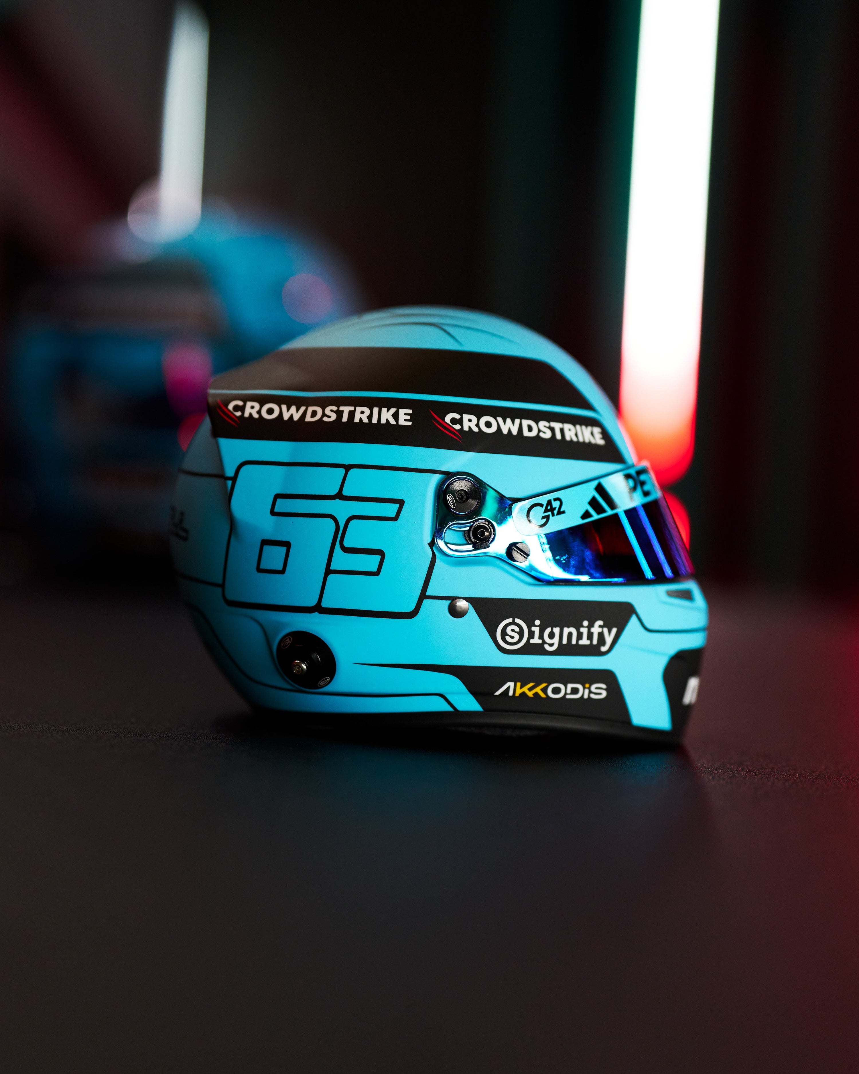 George Russell 2025 Mini Bell Helmet Replica 1:2 — primary product view showing Mercedes-AMG PETRONAS F1 styling and product details | Dash Racegear