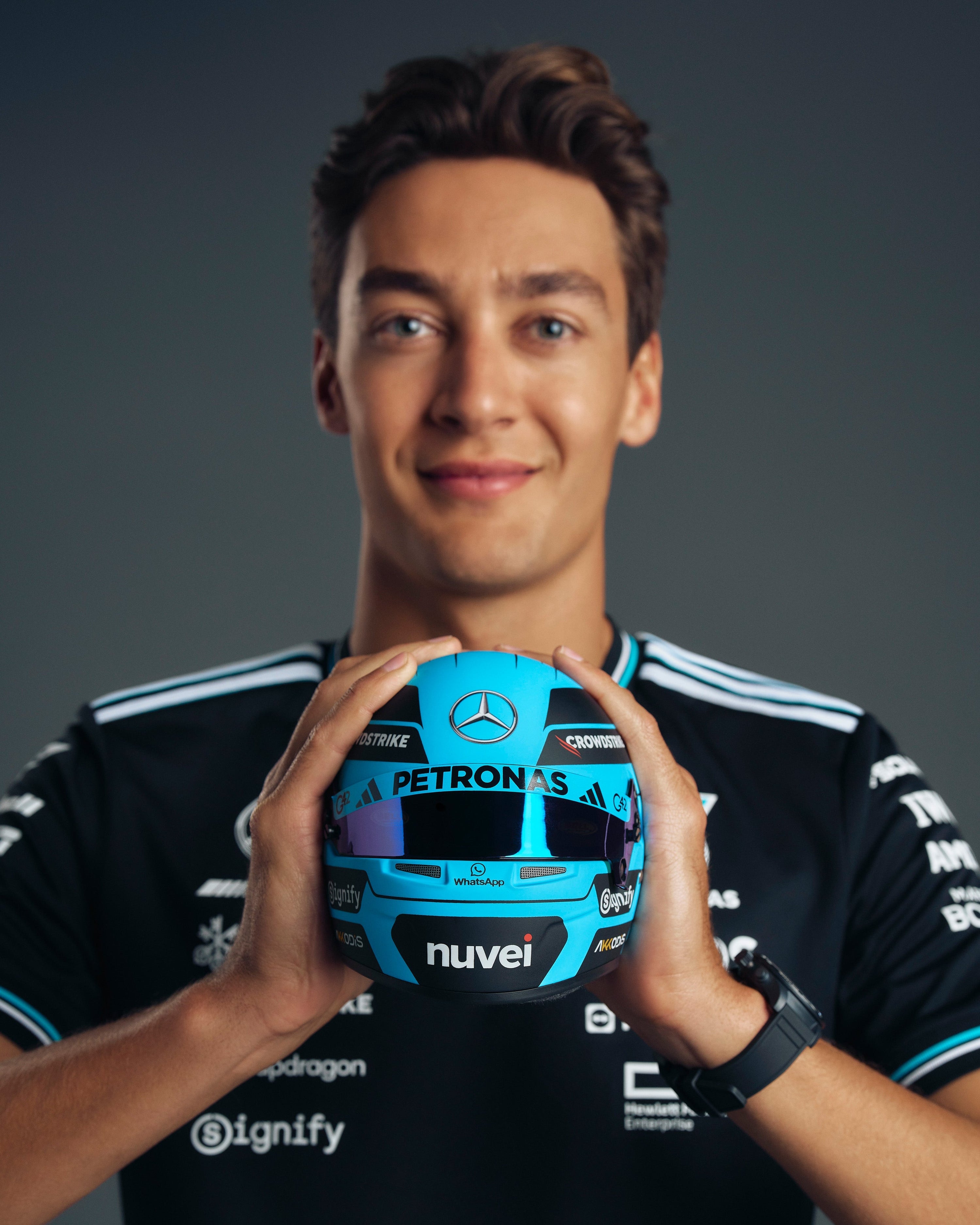 George Russell 2025 Mini Bell Helmet Replica 1:2 — alternate product angle showing Mercedes-AMG PETRONAS F1 styling and product details | Dash Racegear