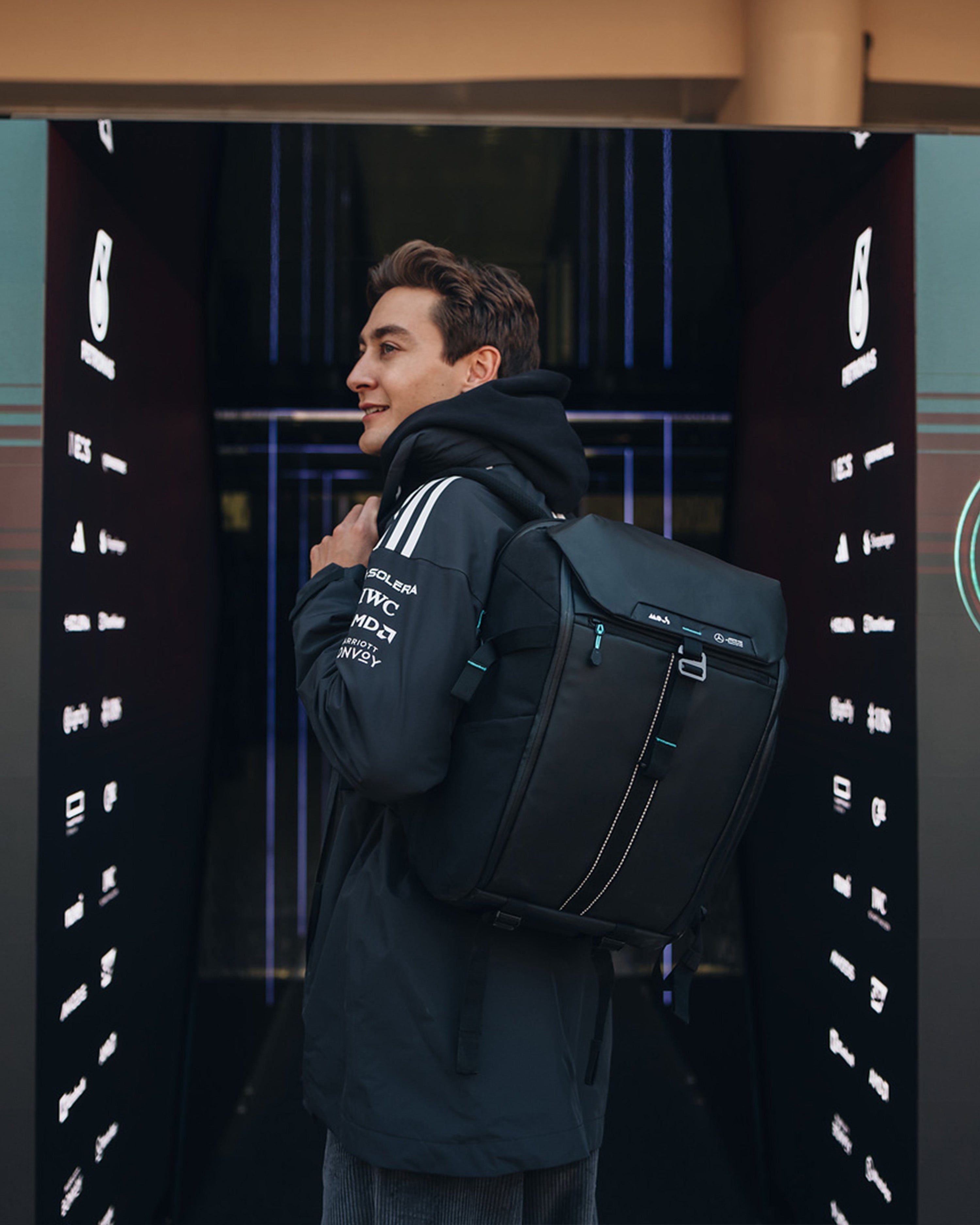 Mous x Mercedes-AMG F1 Team Backpack — close-up design detail showing Mercedes-AMG PETRONAS F1 styling and product details | Dash Racegear