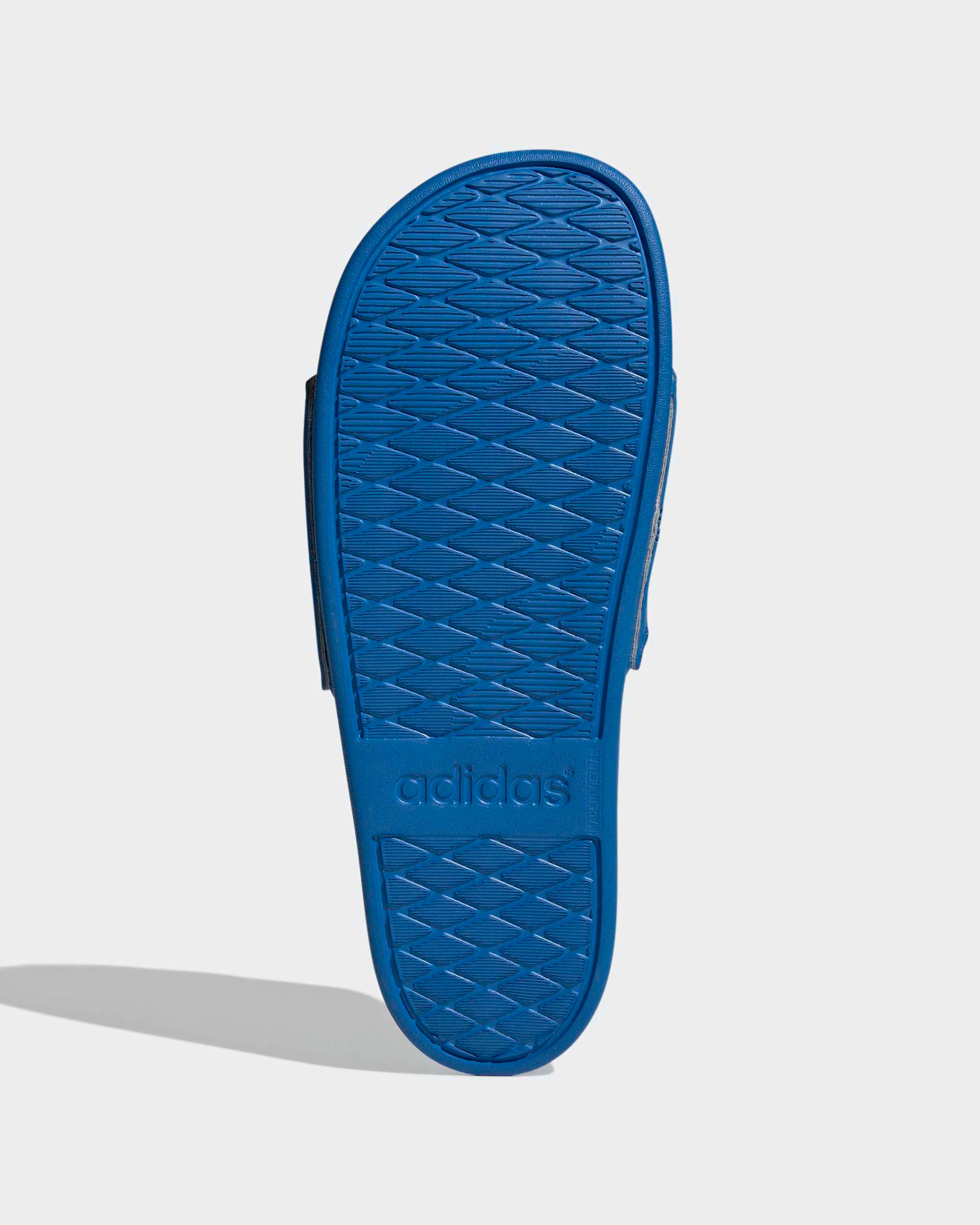 Adilette Comfort Slides Blue — close-up design detail showing Mercedes-AMG PETRONAS F1 styling and product details | Dash Racegear