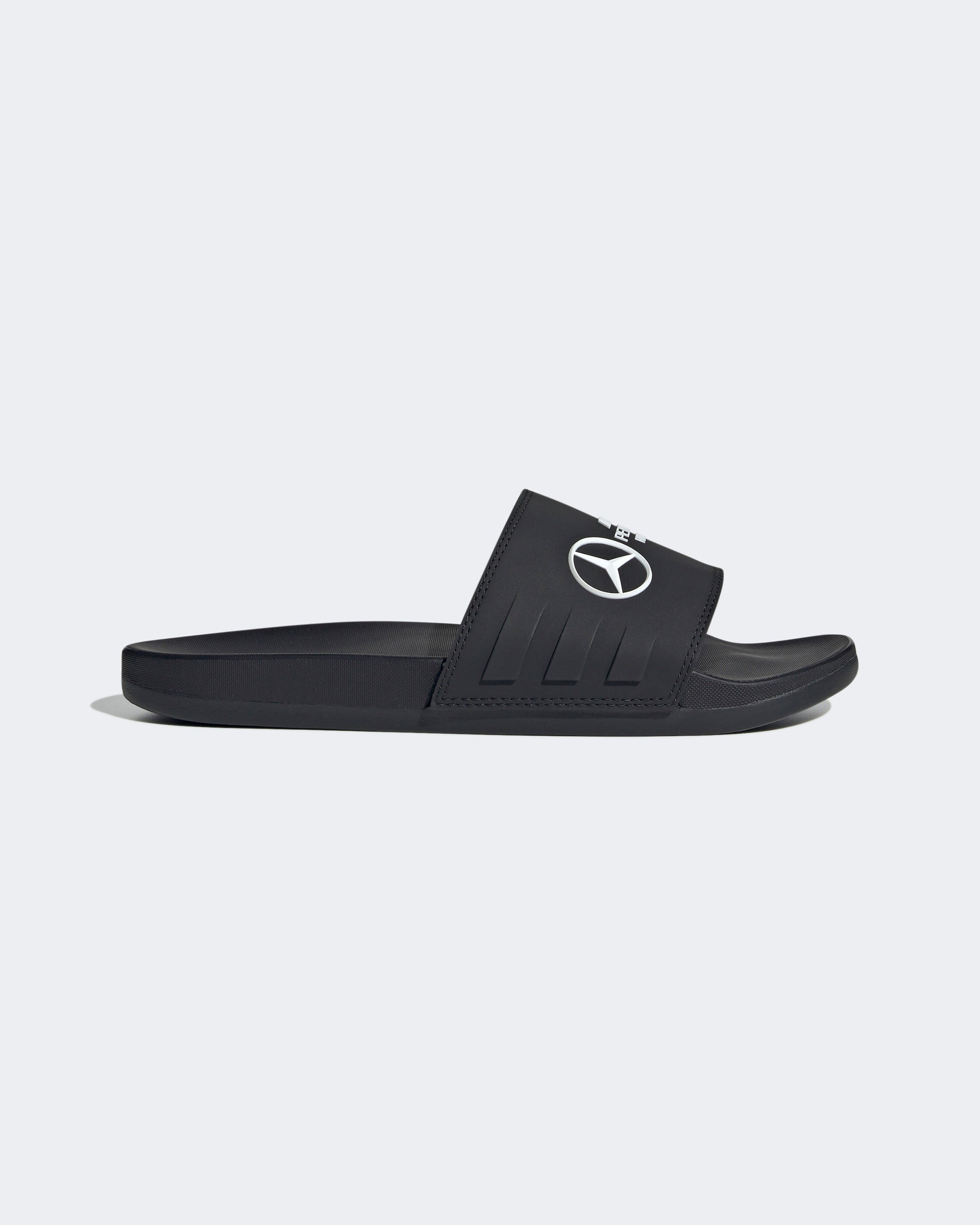 Adilette Comfort Slides Black — primary product view showing Mercedes-AMG PETRONAS F1 styling and product details | Dash Racegear