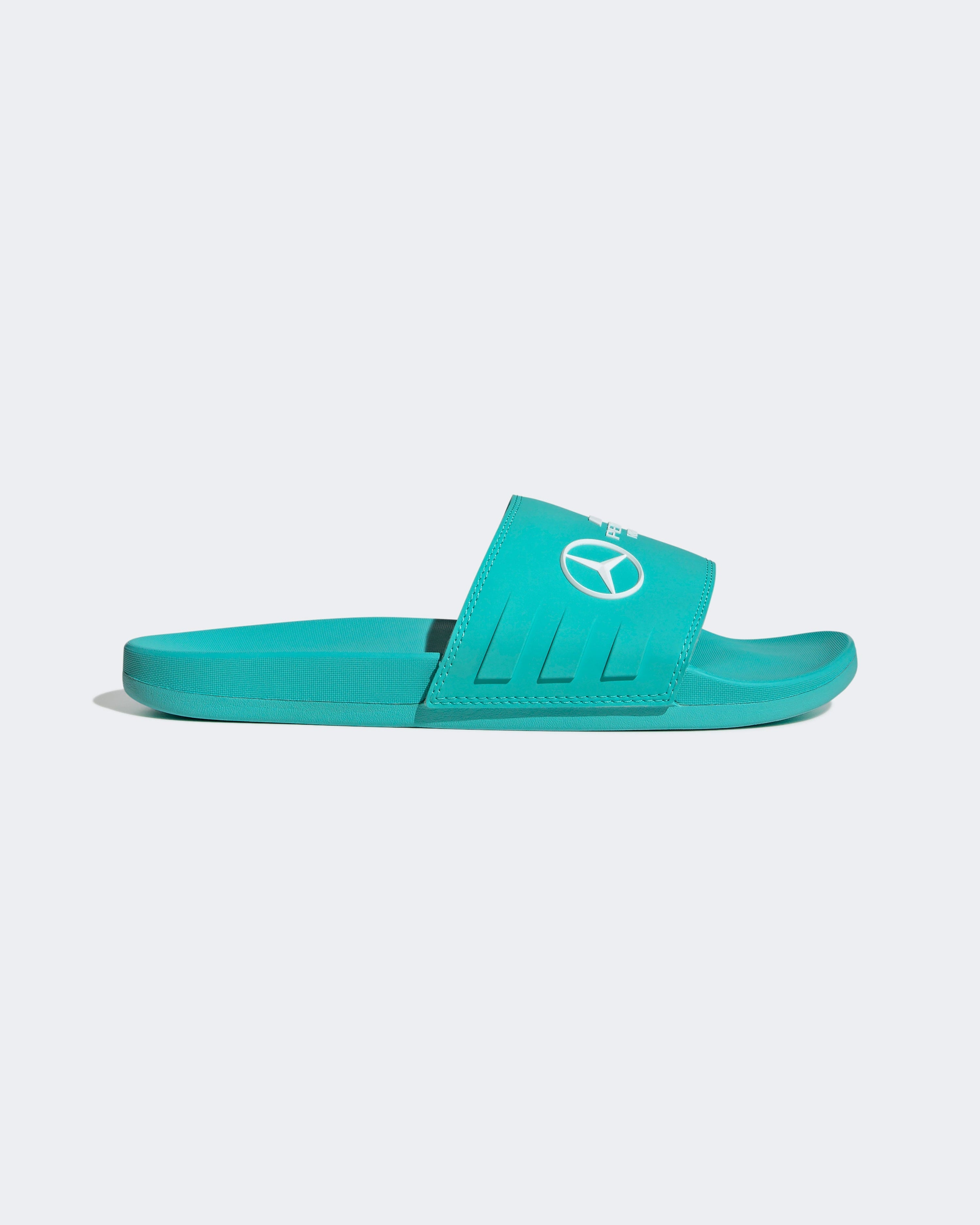 Adilette Comfort Slides Teal — primary product view showing Mercedes-AMG PETRONAS F1 styling and product details | Dash Racegear
