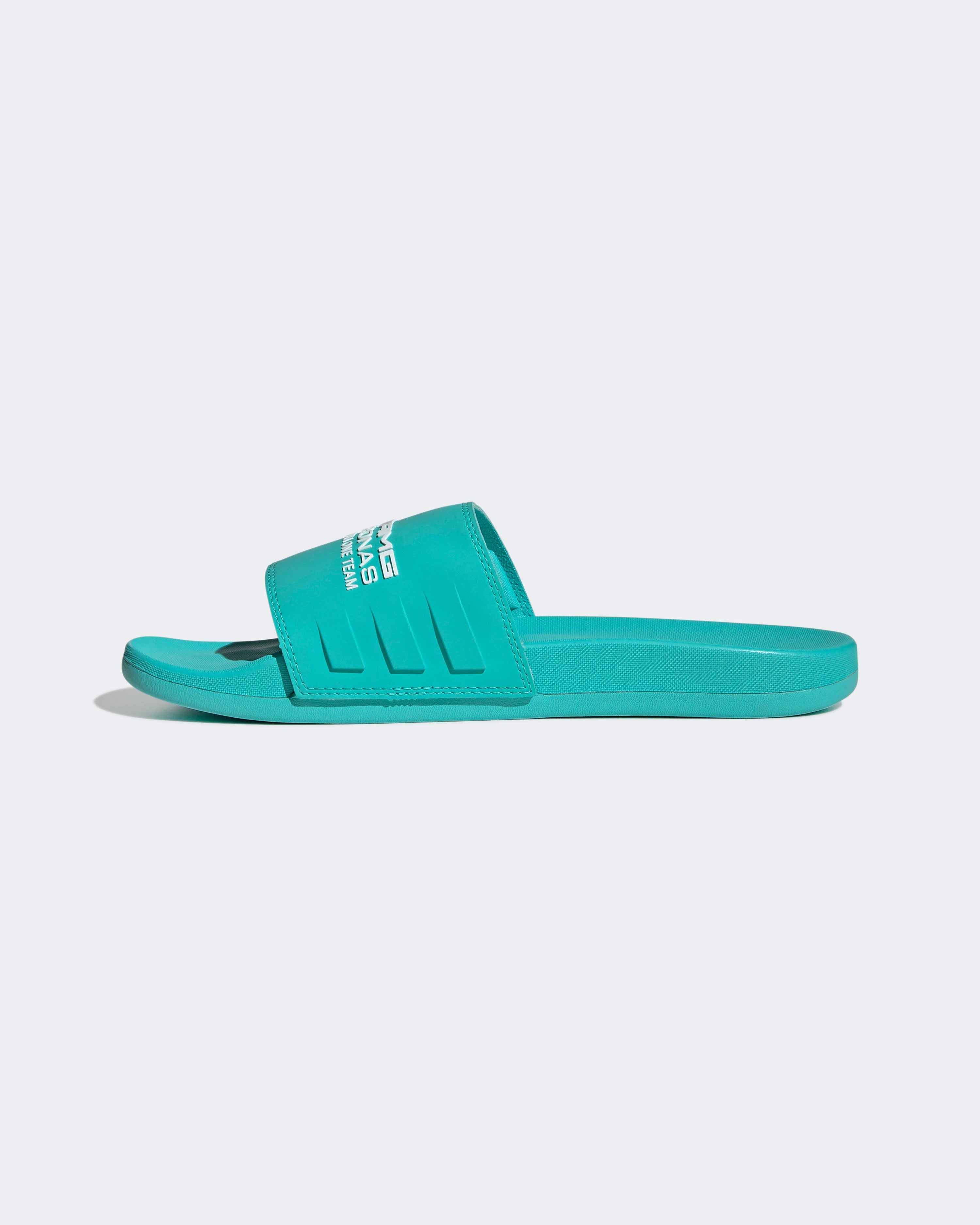 Adilette Comfort Slides Teal — close-up design detail showing Mercedes-AMG PETRONAS F1 styling and product details | Dash Racegear