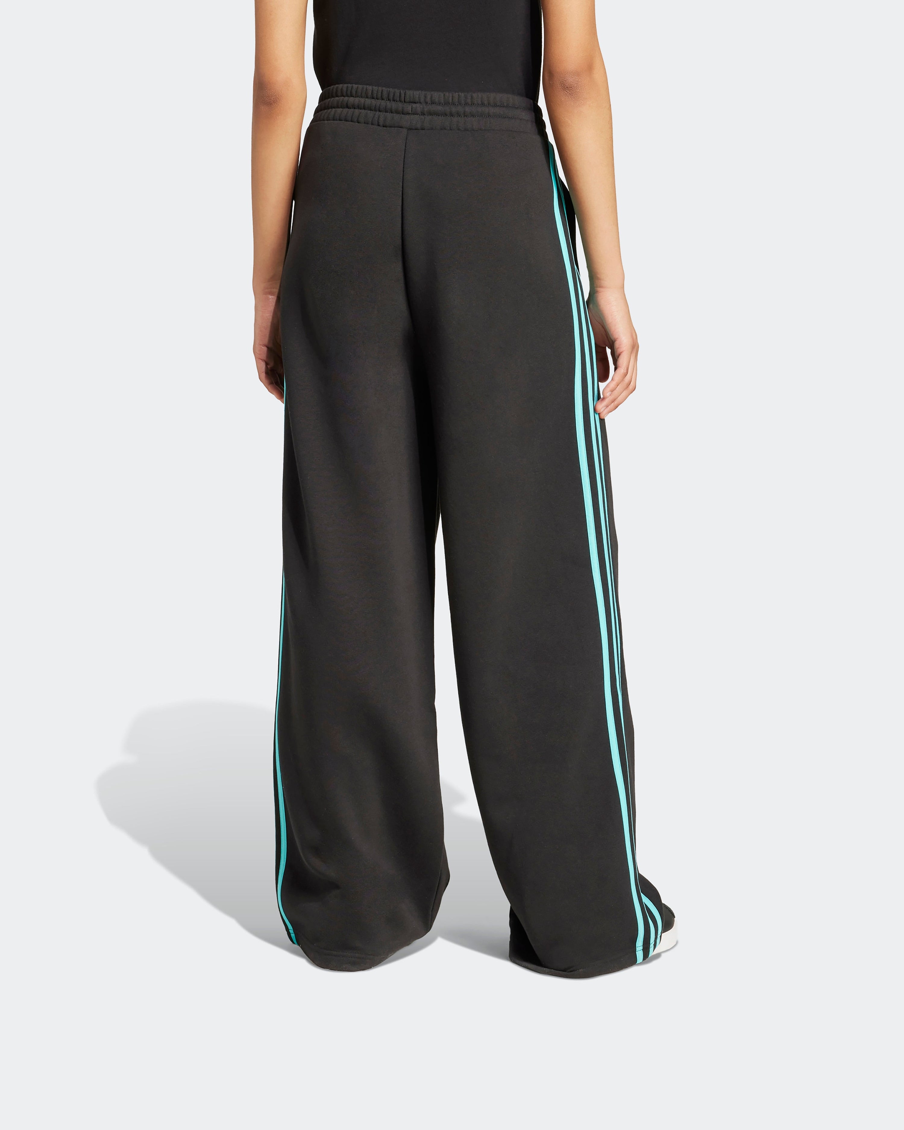 Womens DNA Joggers Black — close-up design detail showing Mercedes-AMG PETRONAS F1 styling and product details | Dash Racegear