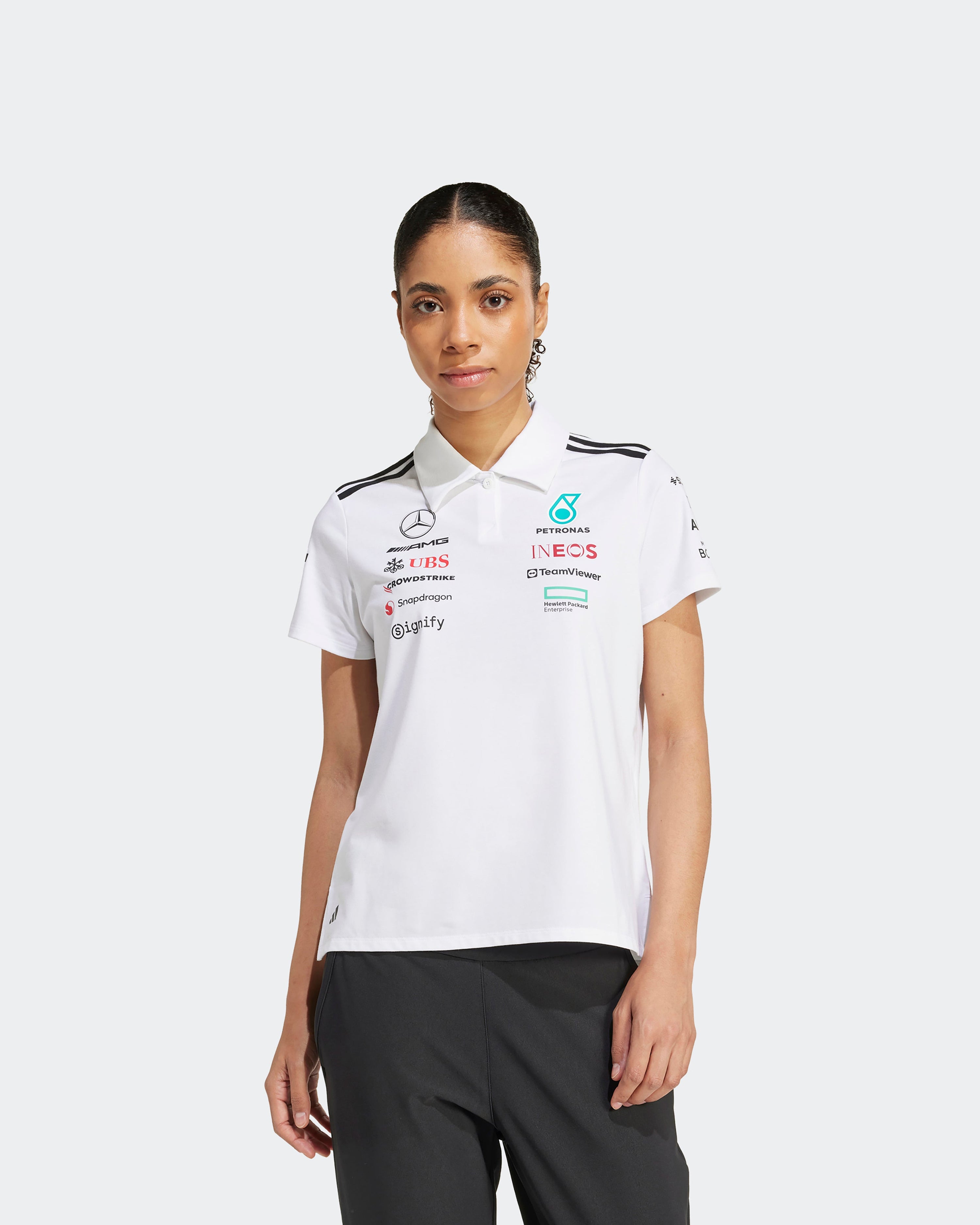 Womens 2025 Team Polo White — primary product view showing Mercedes-AMG PETRONAS F1 styling and product details | Dash Racegear