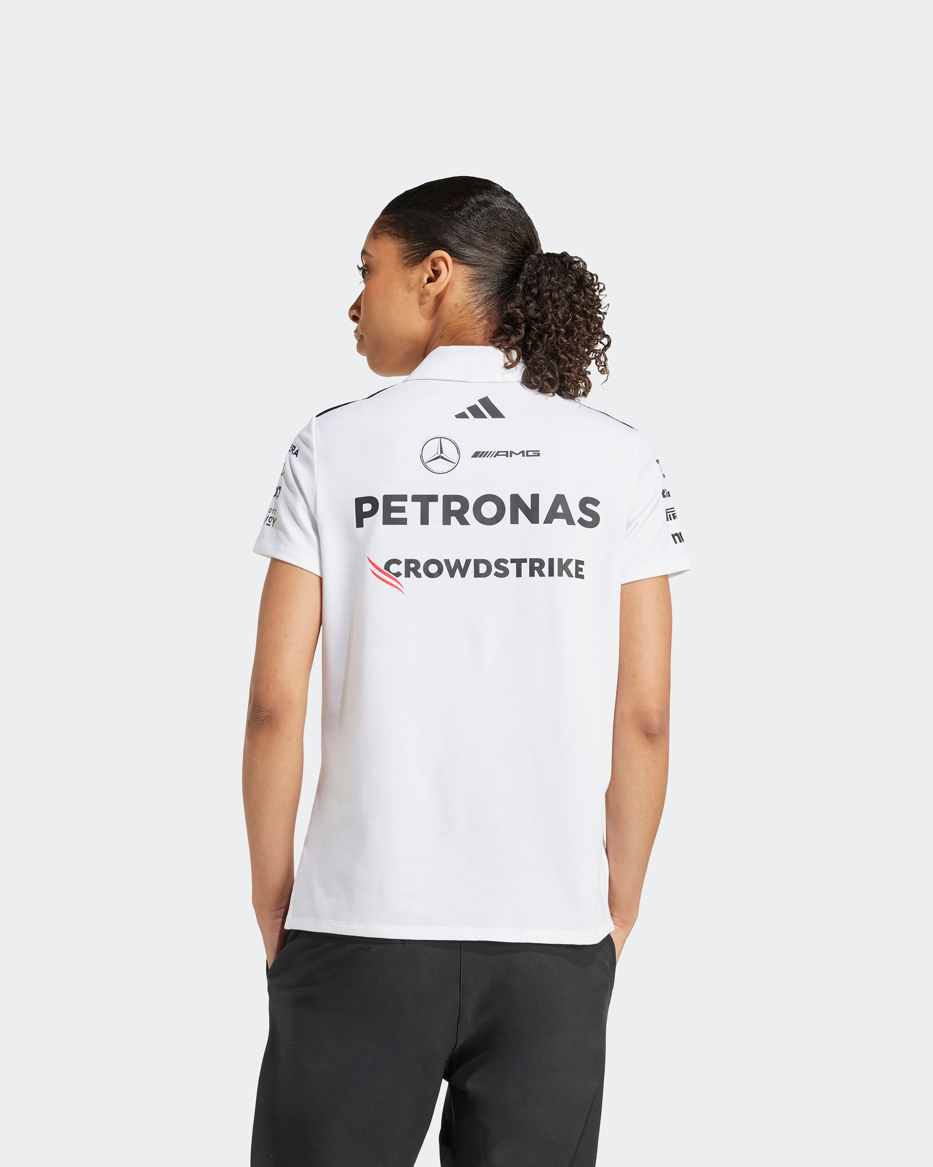 Womens 2025 Team Polo White — alternate product angle showing Mercedes-AMG PETRONAS F1 styling and product details | Dash Racegear