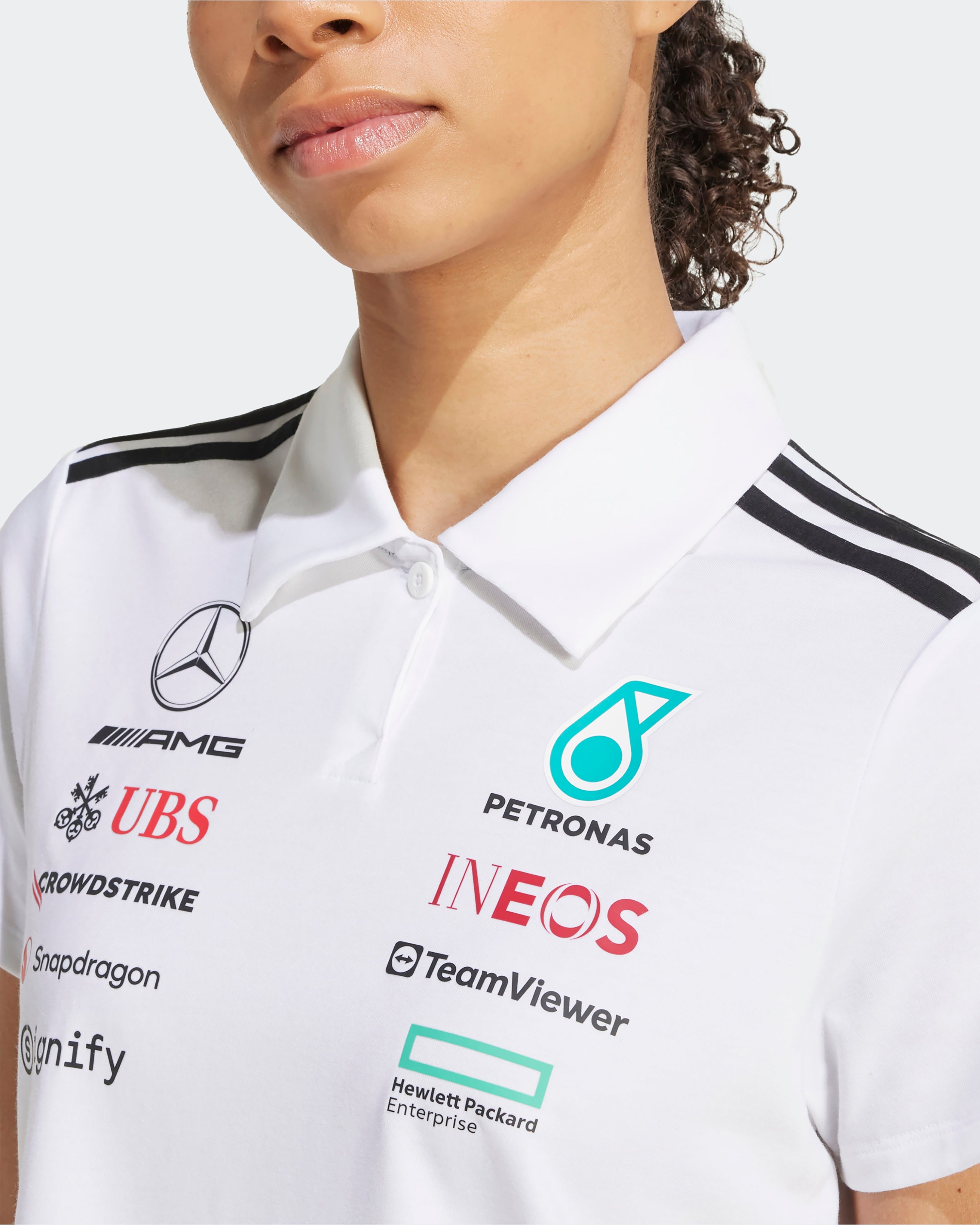 Womens 2025 Team Polo White — additional product detail showing Mercedes-AMG PETRONAS F1 styling and product details | Dash Racegear