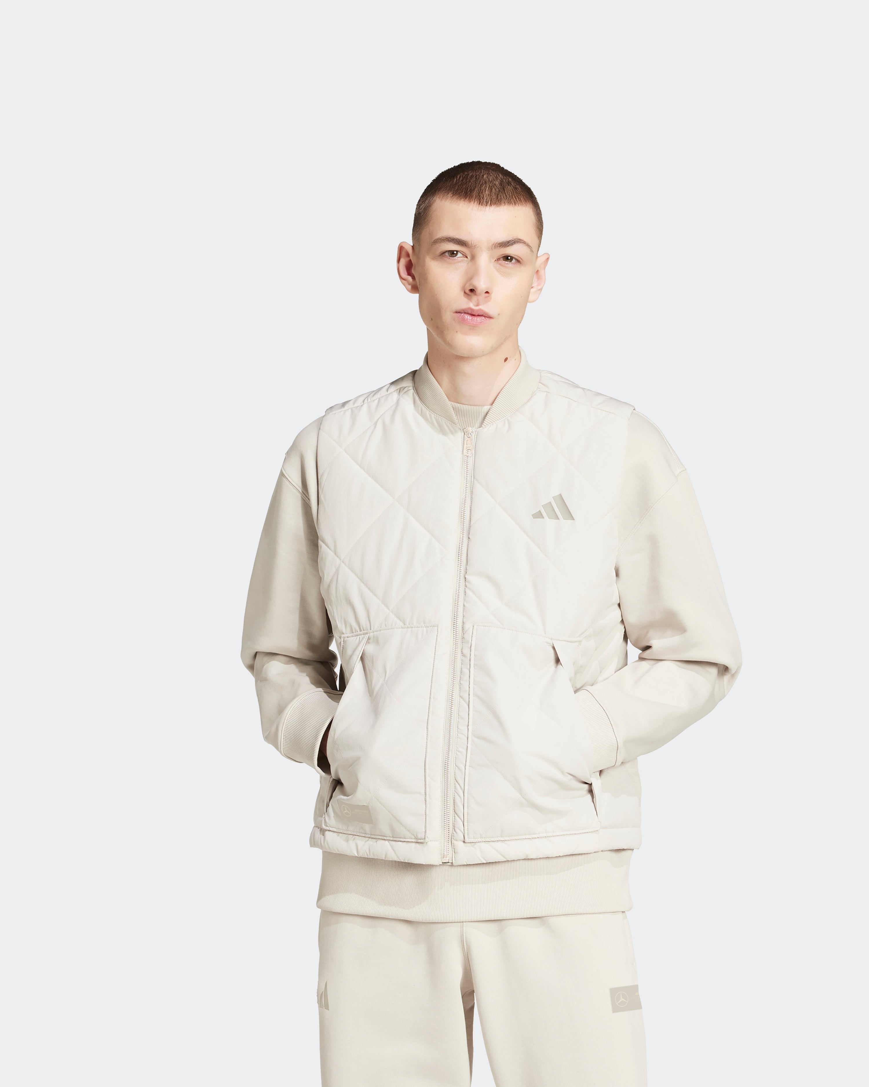 Mens Premium Sweat Vest Beige — primary product view showing Mercedes-AMG PETRONAS F1 styling and product details | Dash Racegear