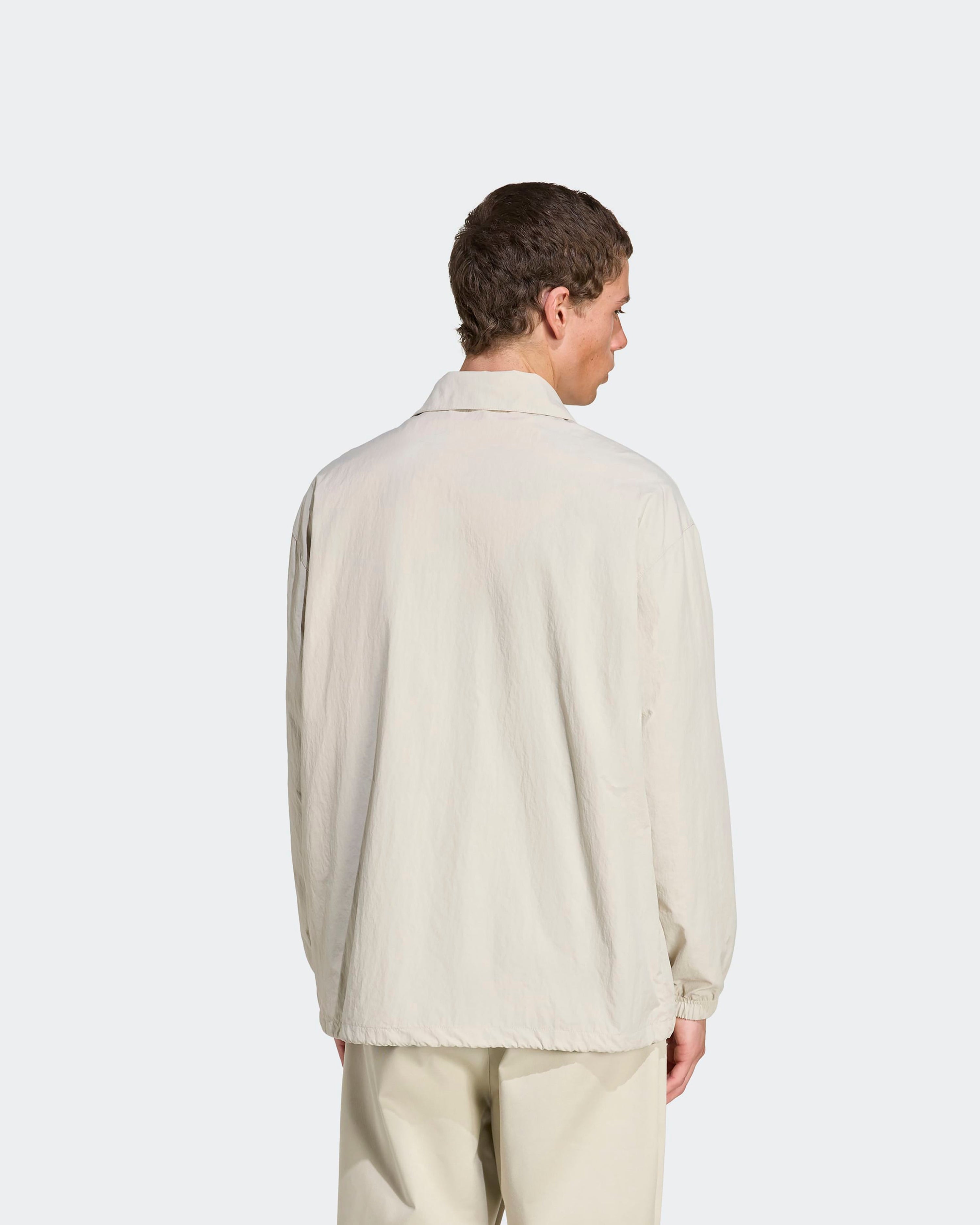 Mens Miami Coach Jacket Beige — alternate product angle showing Mercedes-AMG PETRONAS F1 styling and product details | Dash Racegear