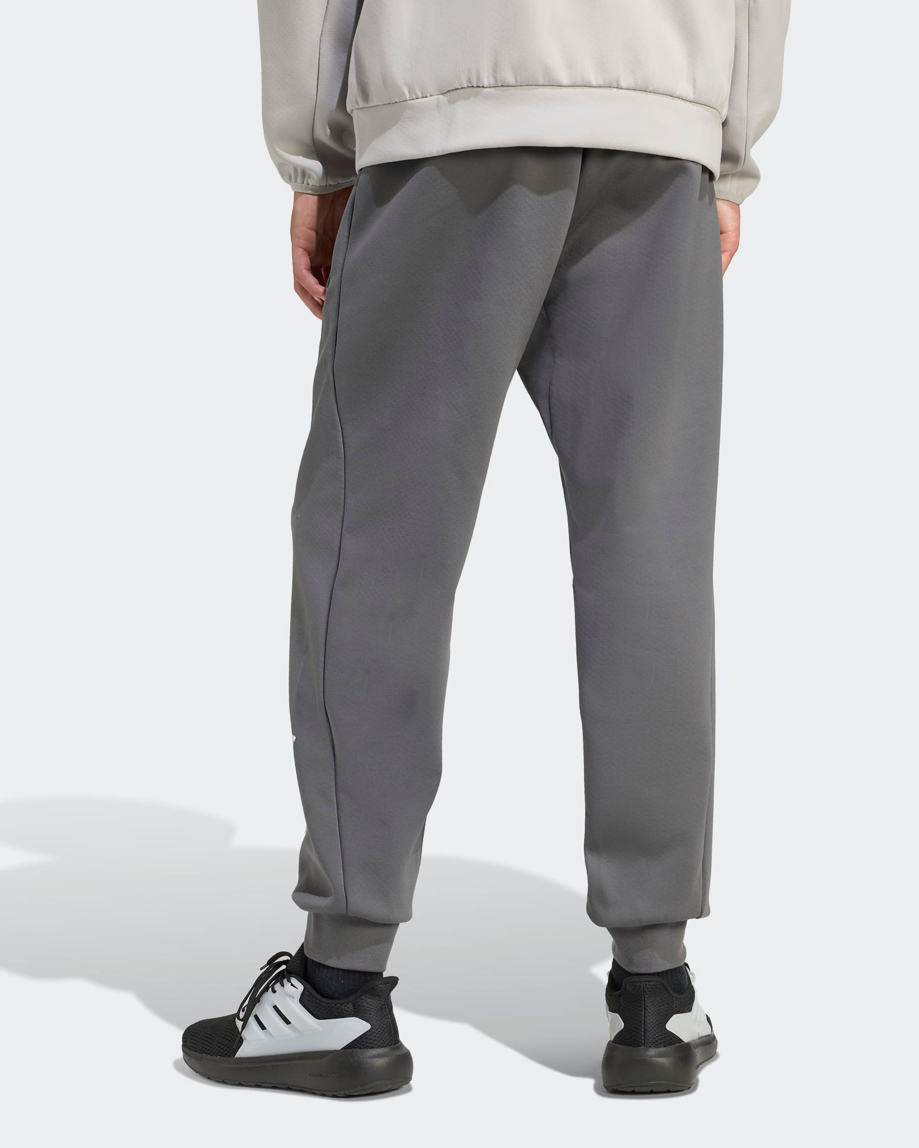 Mens Silver Arrows Joggers Grey — close-up design detail showing Mercedes-AMG PETRONAS F1 styling and product details | Dash Racegear