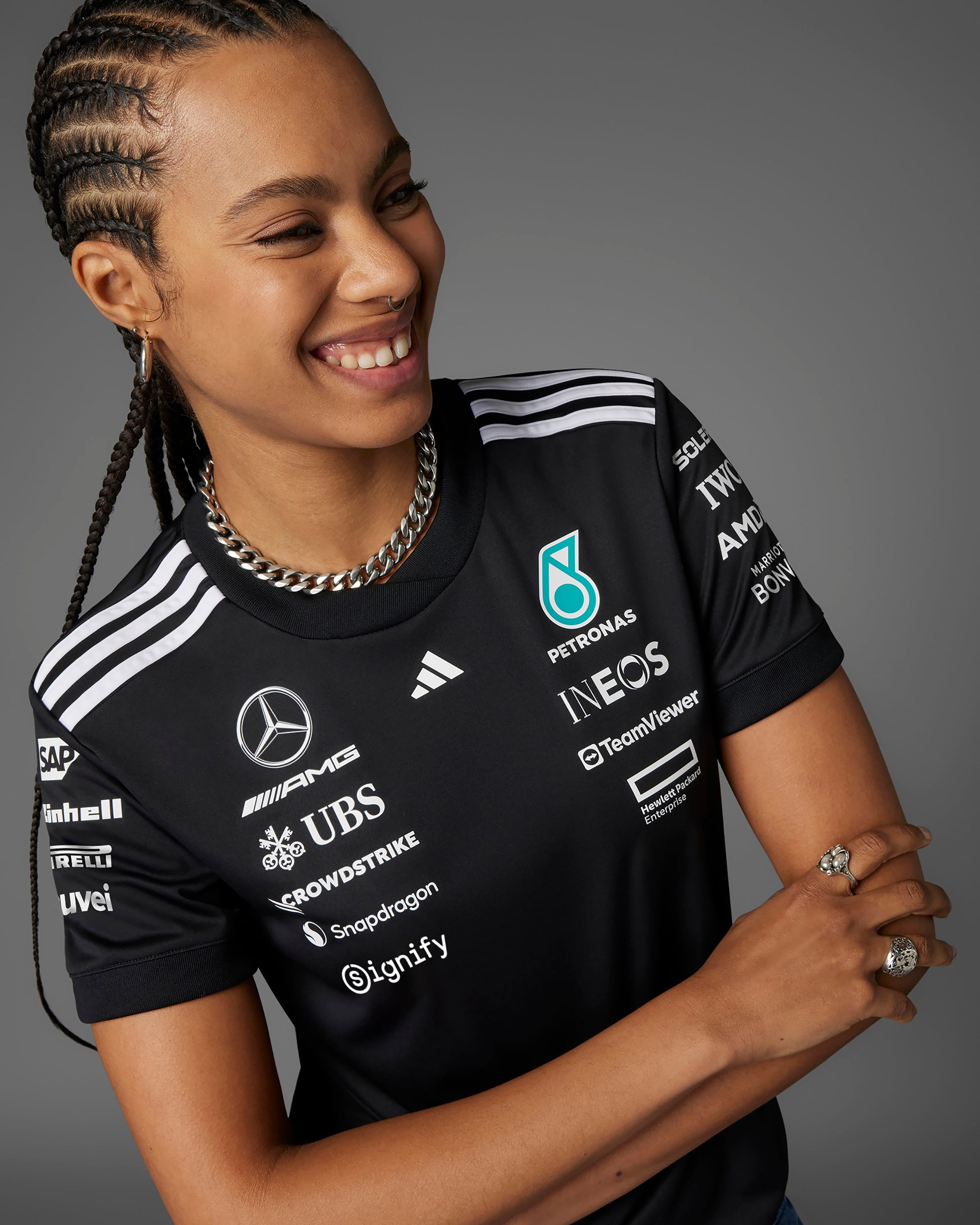 Womens 2025 Team Driver Tee Black — primary product view showing Mercedes-AMG PETRONAS F1 styling and product details | Dash Racegear