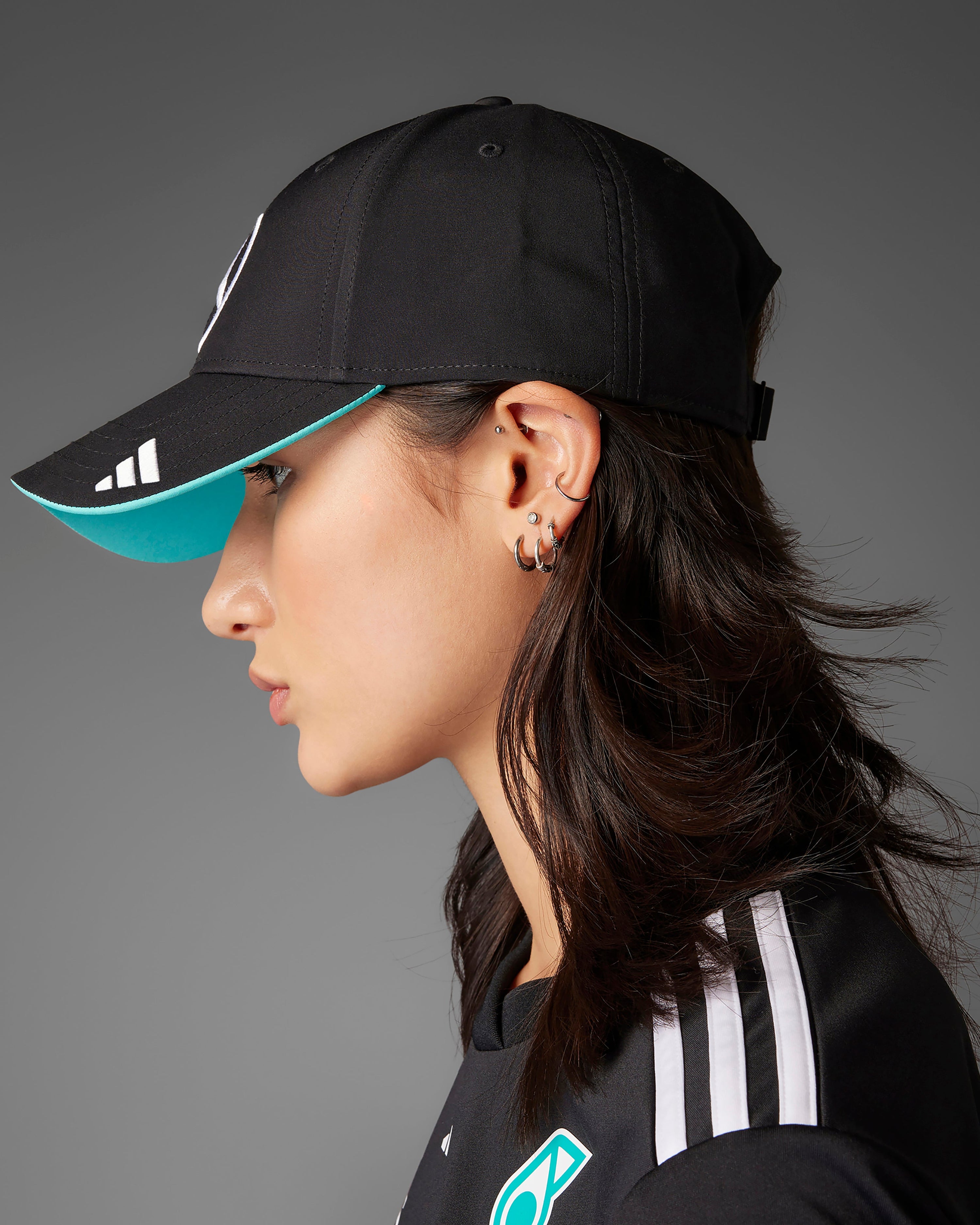 2025 Driver Cap Black — close-up design detail showing Mercedes-AMG PETRONAS F1 styling and product details | Dash Racegear