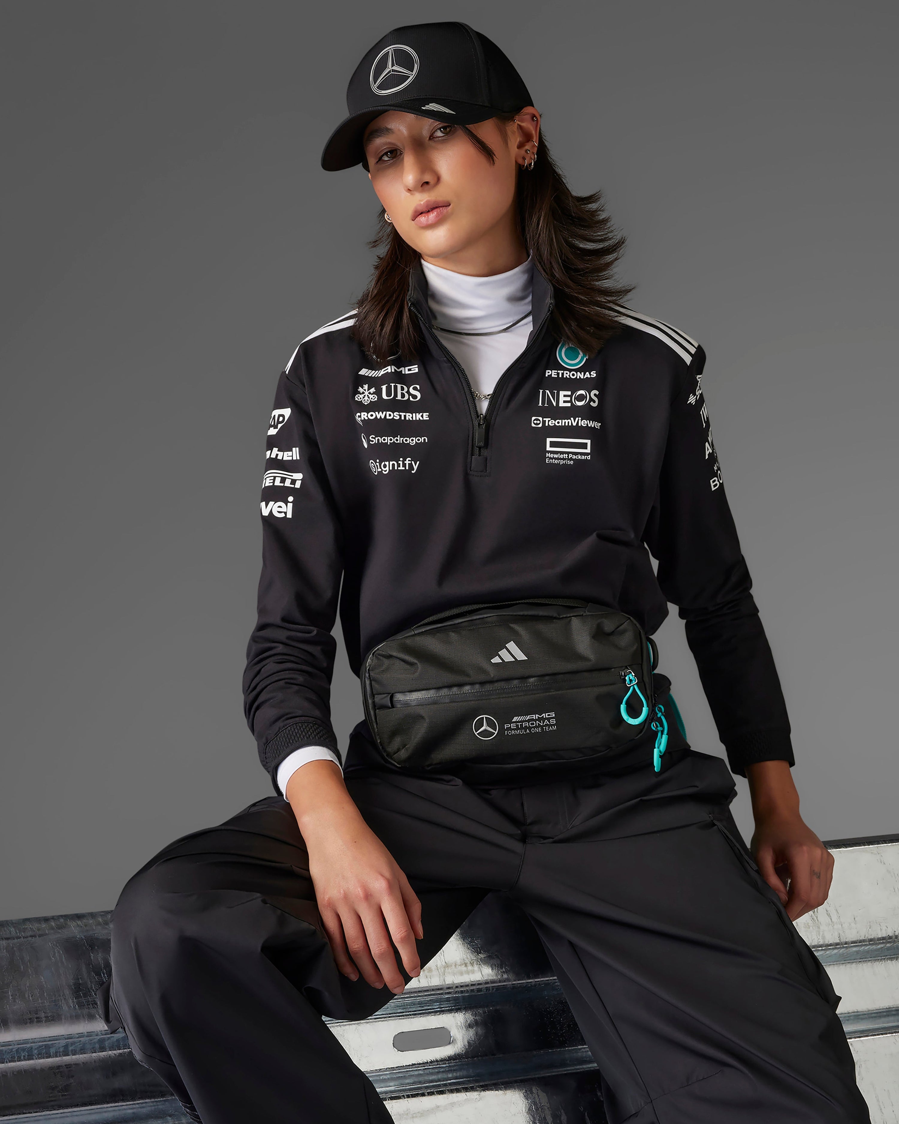 Womens 2025 Team Quarter Zip Black — primary product view showing Mercedes-AMG PETRONAS F1 styling and product details | Dash Racegear