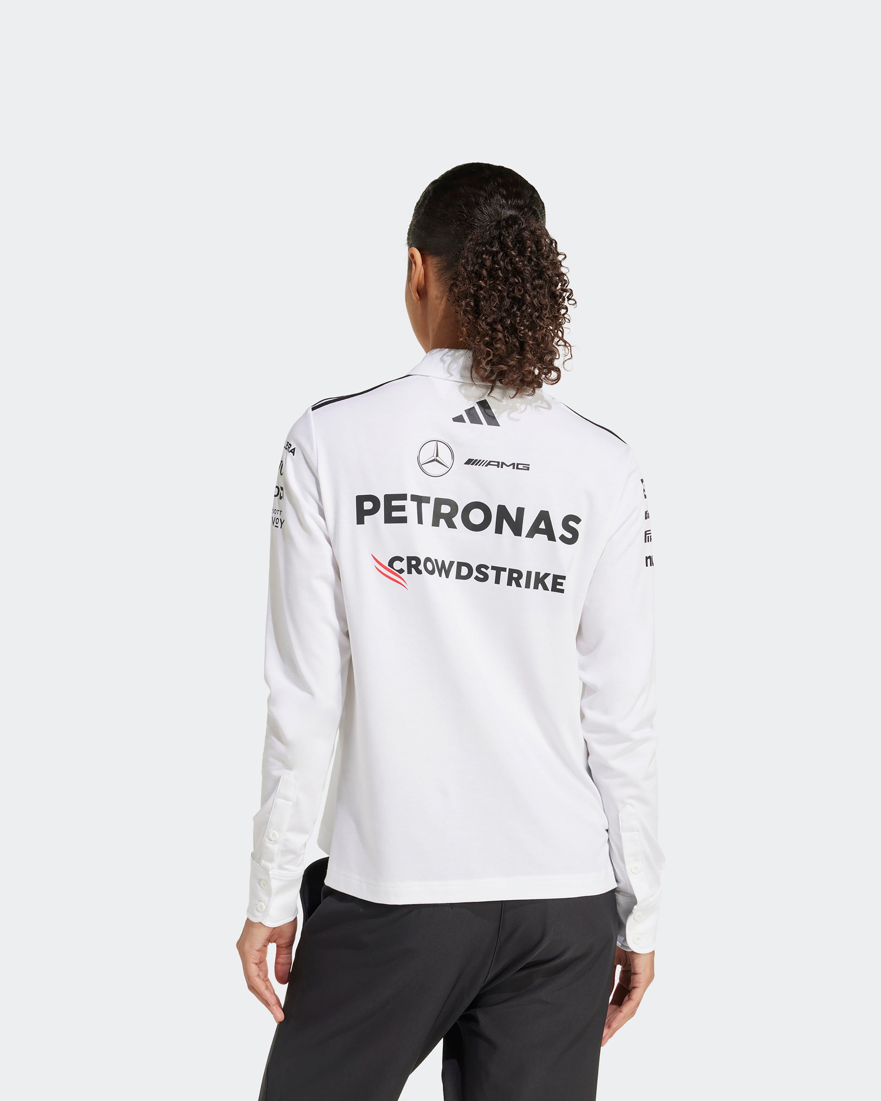 Womens 2025 Team Long Sleeve Polo White — additional product detail showing Mercedes-AMG PETRONAS F1 styling and product details | Dash Racegear