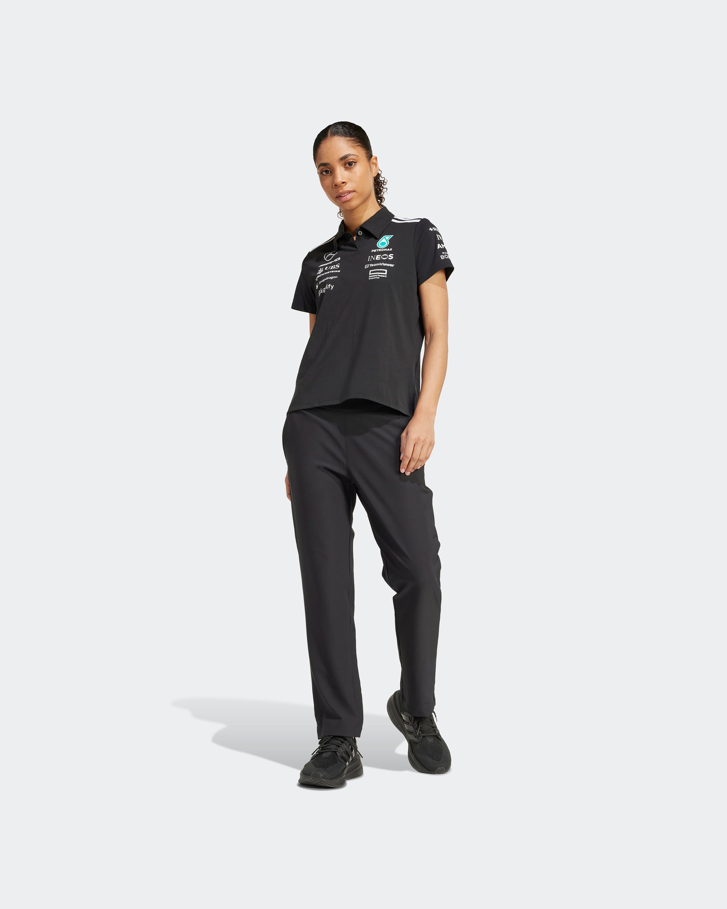 Womens 2025 Team Polo Black — additional product detail showing Mercedes-AMG PETRONAS F1 styling and product details | Dash Racegear