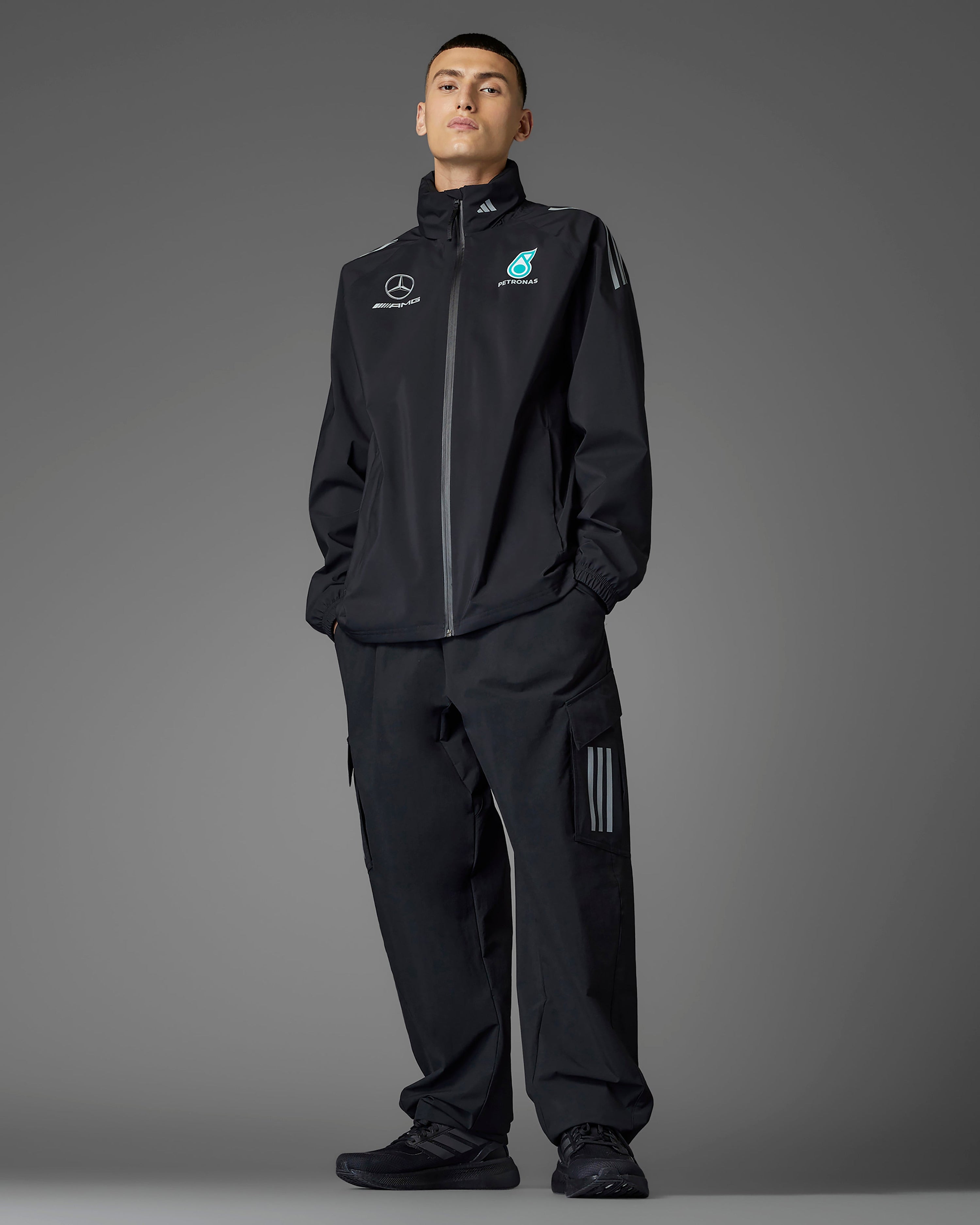 Mens 2025 Mechanics Rain Jacket Black — primary product view showing Mercedes-AMG PETRONAS F1 styling and product details | Dash Racegear