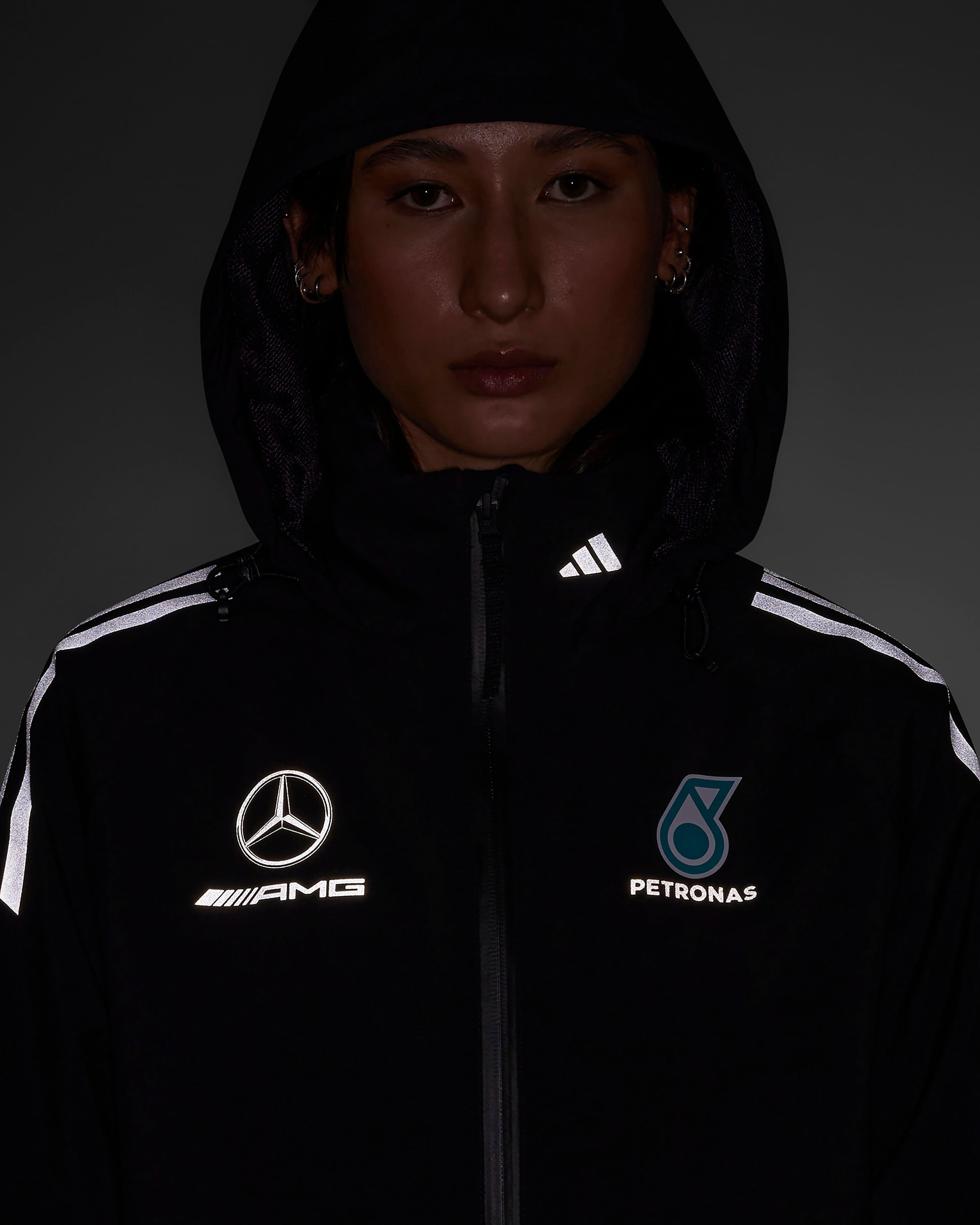 Womens 2025 Mechanics Rain Jacket Black — alternate product angle showing Mercedes-AMG PETRONAS F1 styling and product details | Dash Racegear