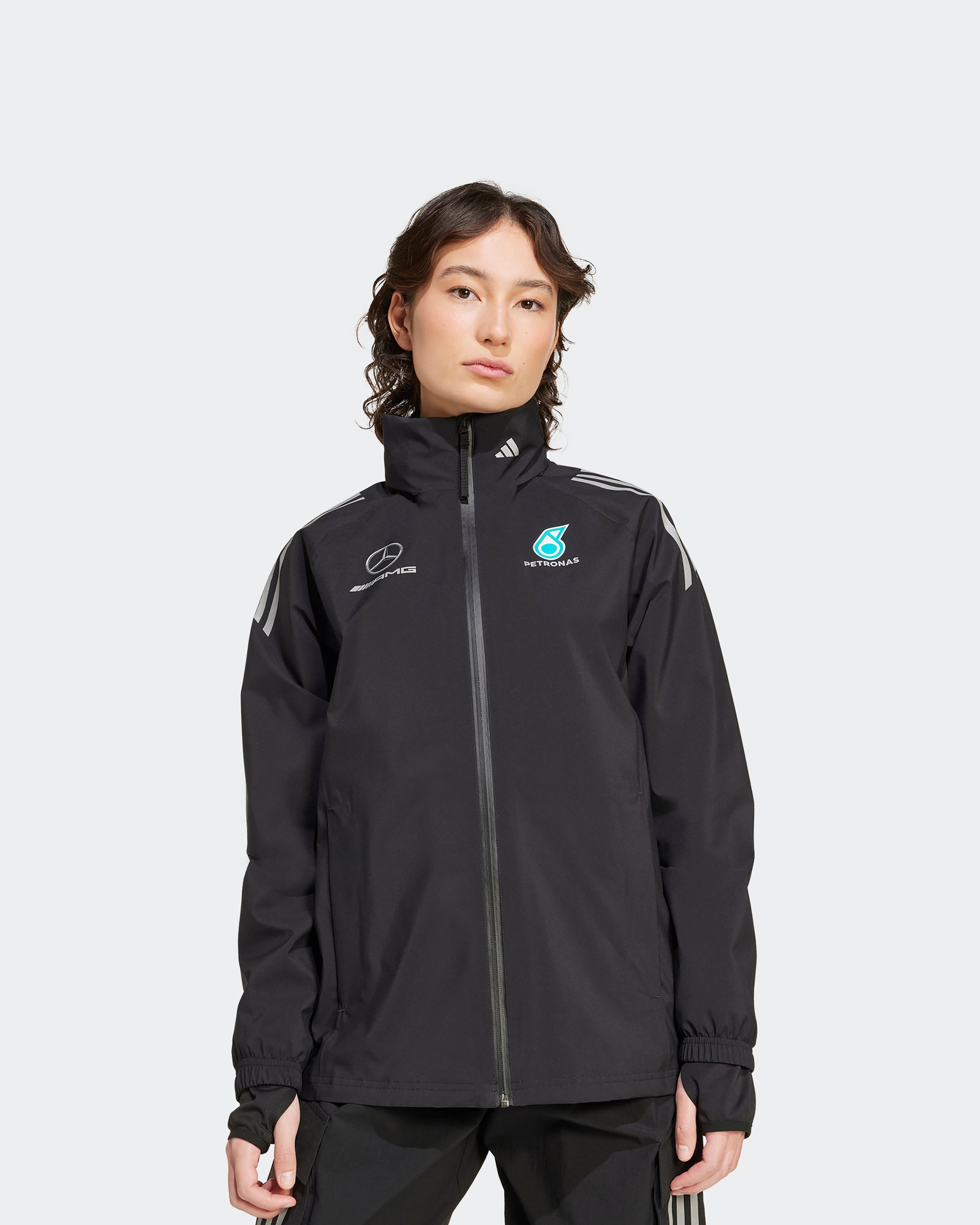 Womens 2025 Mechanics Rain Jacket Black — close-up design detail showing Mercedes-AMG PETRONAS F1 styling and product details | Dash Racegear