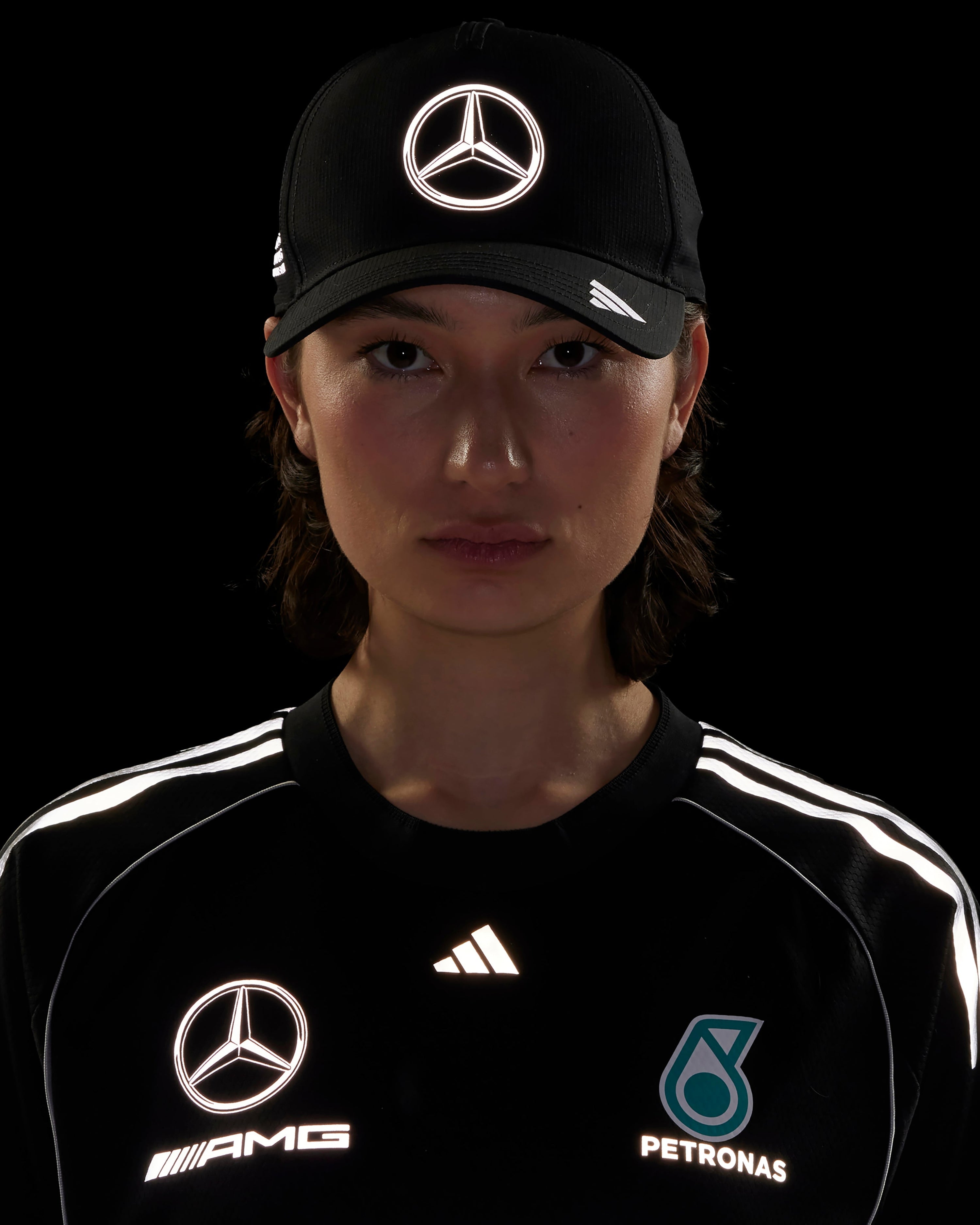 2025 Mechanics Climacool Trucker Cap Black — close-up design detail showing Mercedes-AMG PETRONAS F1 styling and product details | Dash Racegear