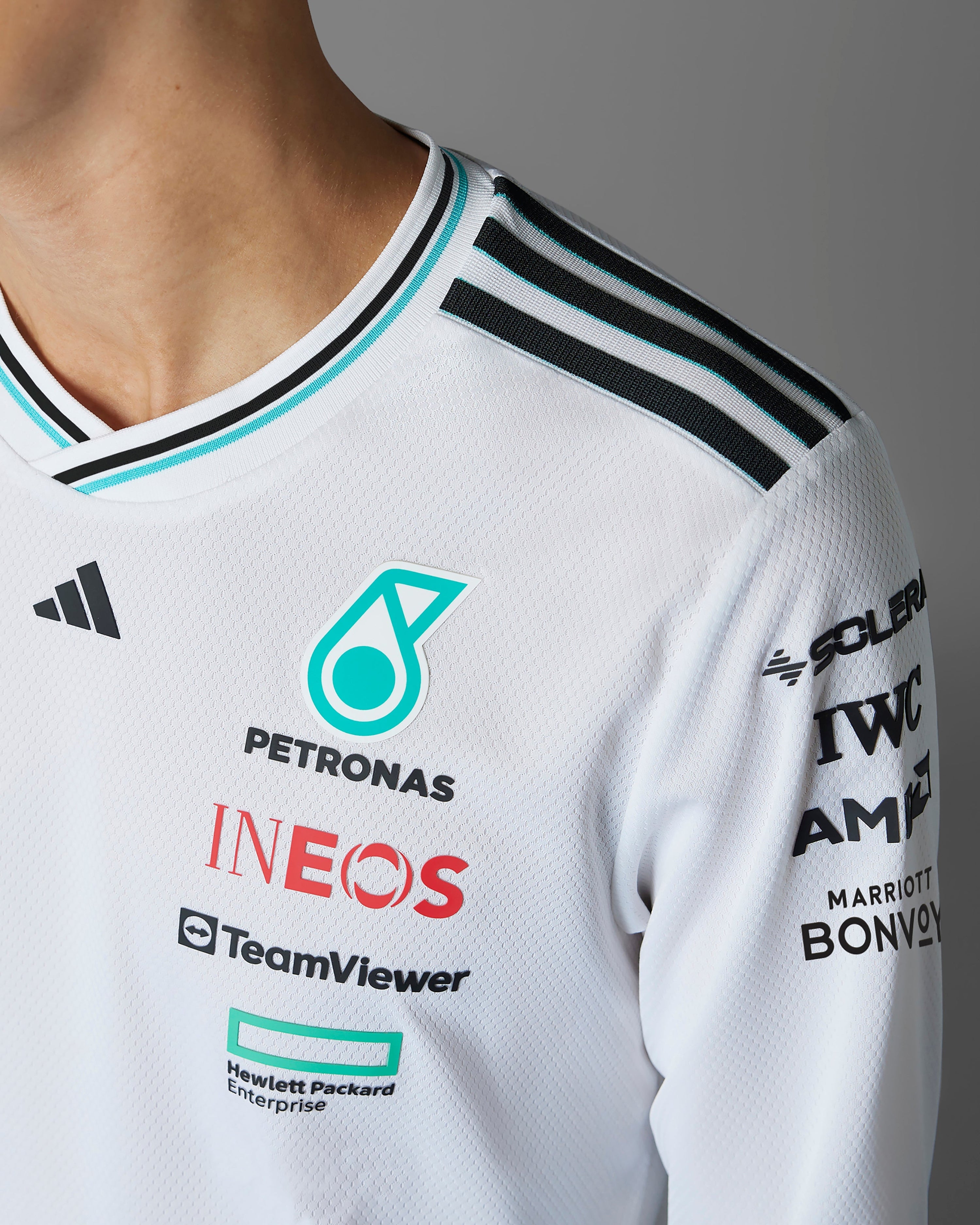 Mens 2025 Authentic Long Sleeve Driver Tee White — additional product detail showing Mercedes-AMG PETRONAS F1 styling and product details | Dash Racegear