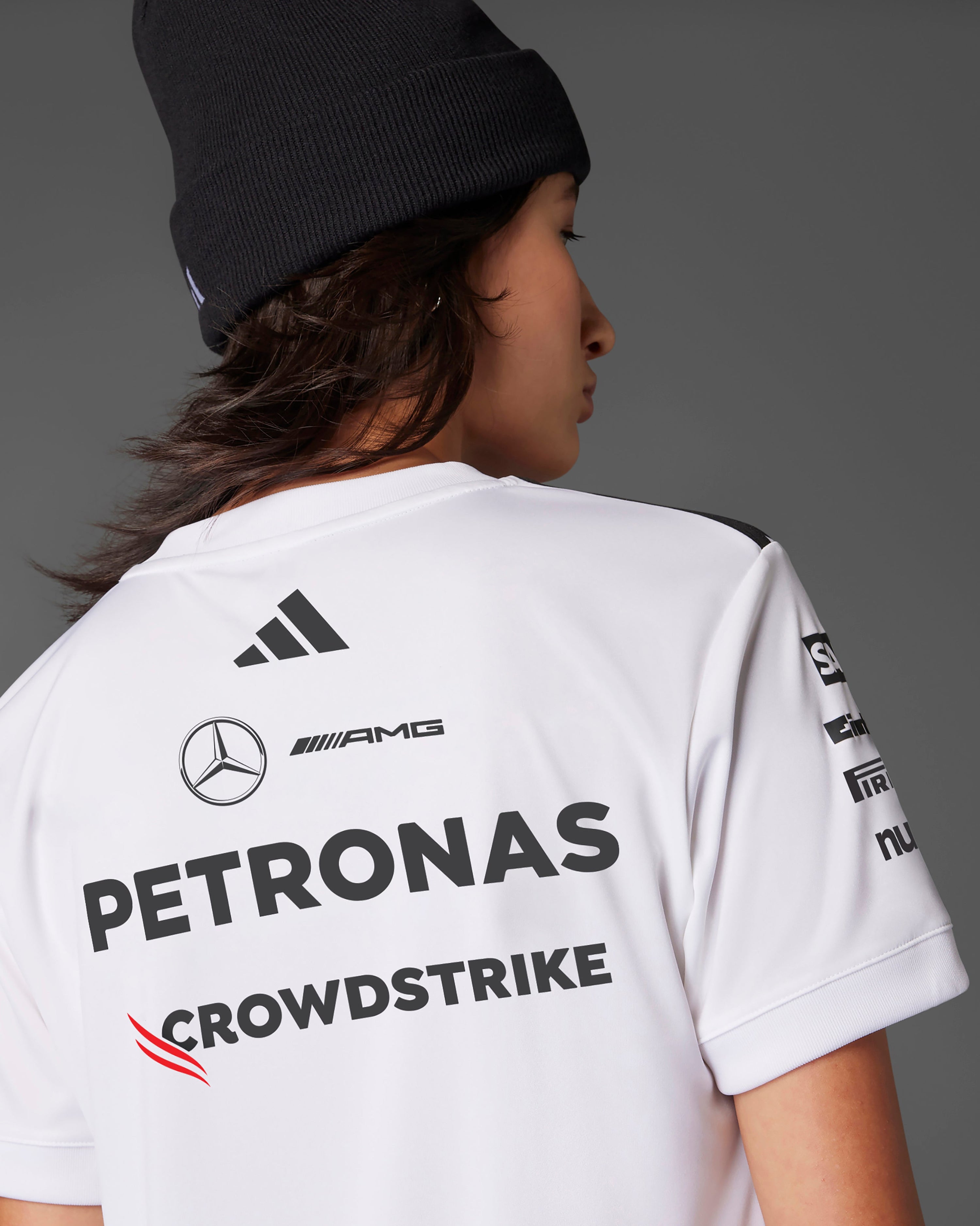 Womens 2025 Team Driver Tee White — alternate product angle showing Mercedes-AMG PETRONAS F1 styling and product details | Dash Racegear