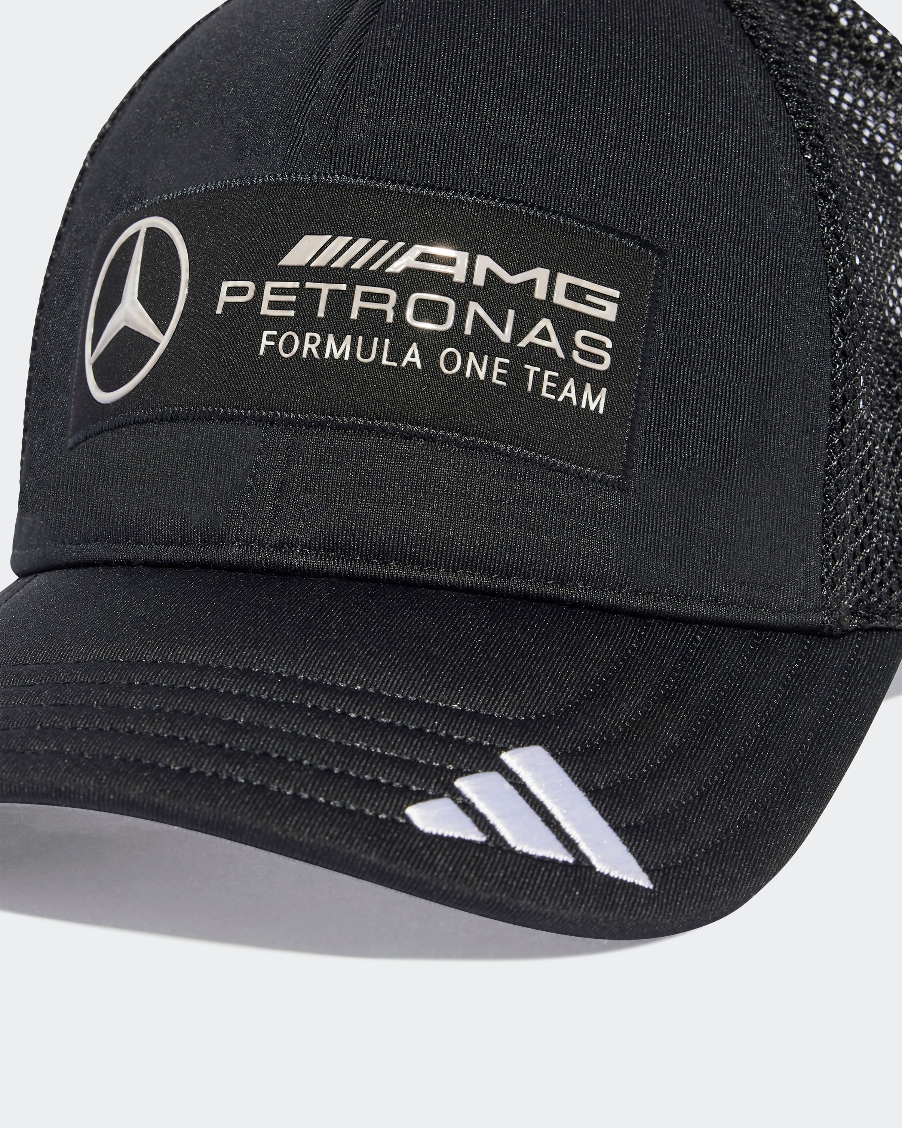 2025 Team Trucker Cap Black — close-up design detail showing Mercedes-AMG PETRONAS F1 styling and product details | Dash Racegear