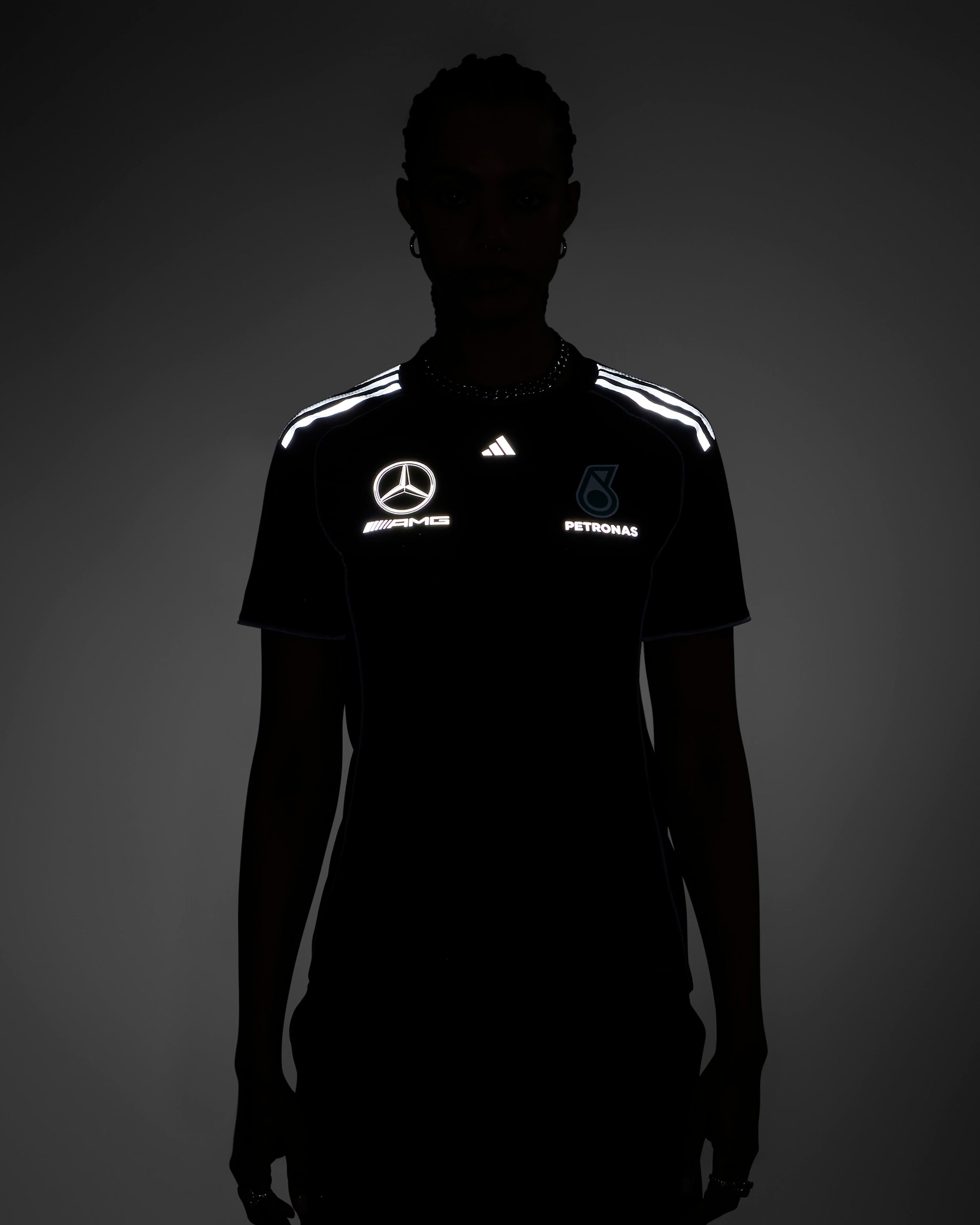 Womens 2025 Mechanics Tee Black — close-up design detail showing Mercedes-AMG PETRONAS F1 styling and product details | Dash Racegear