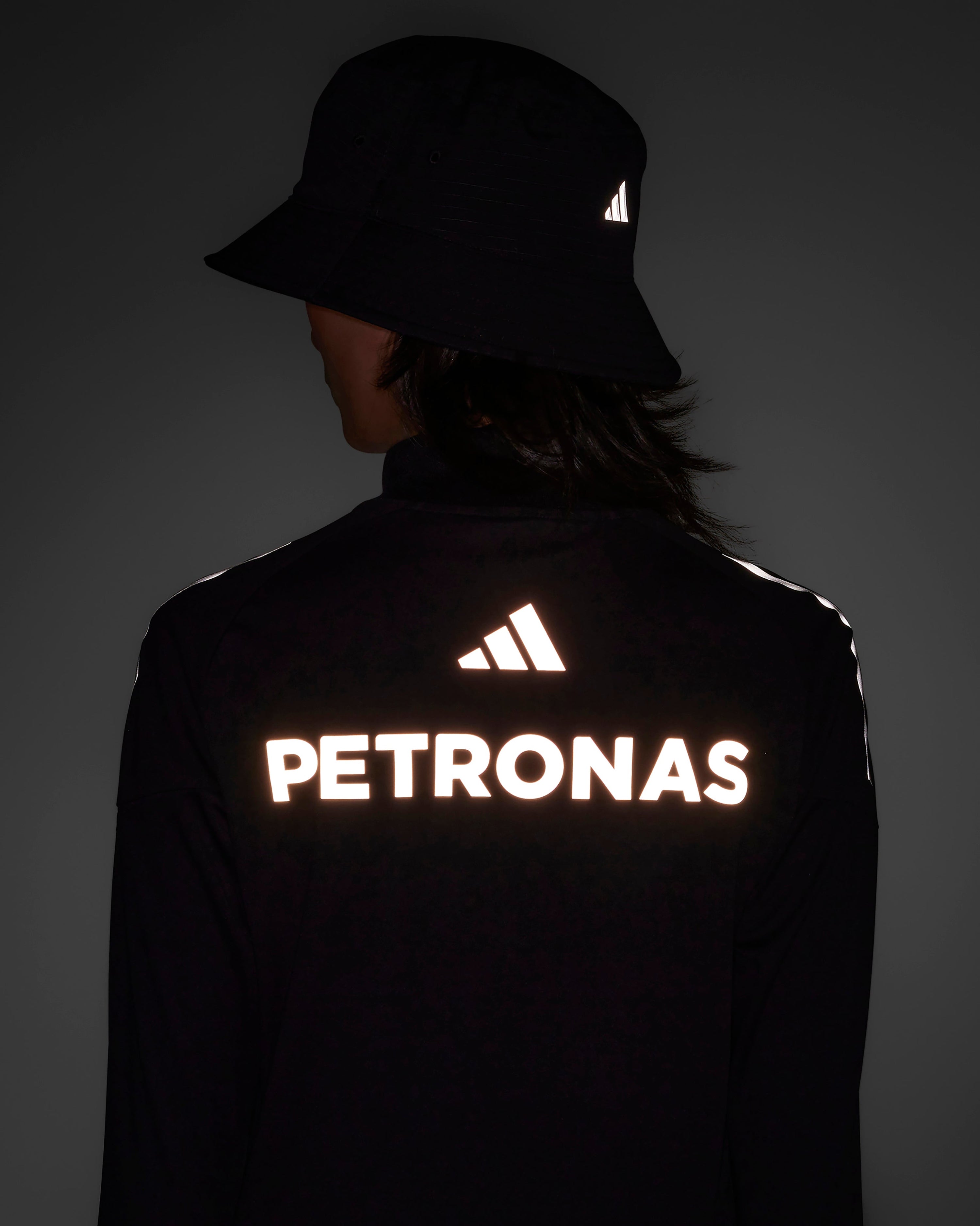 Womens 2025 Mechanics Top Black — close-up design detail showing Mercedes-AMG PETRONAS F1 styling and product details | Dash Racegear