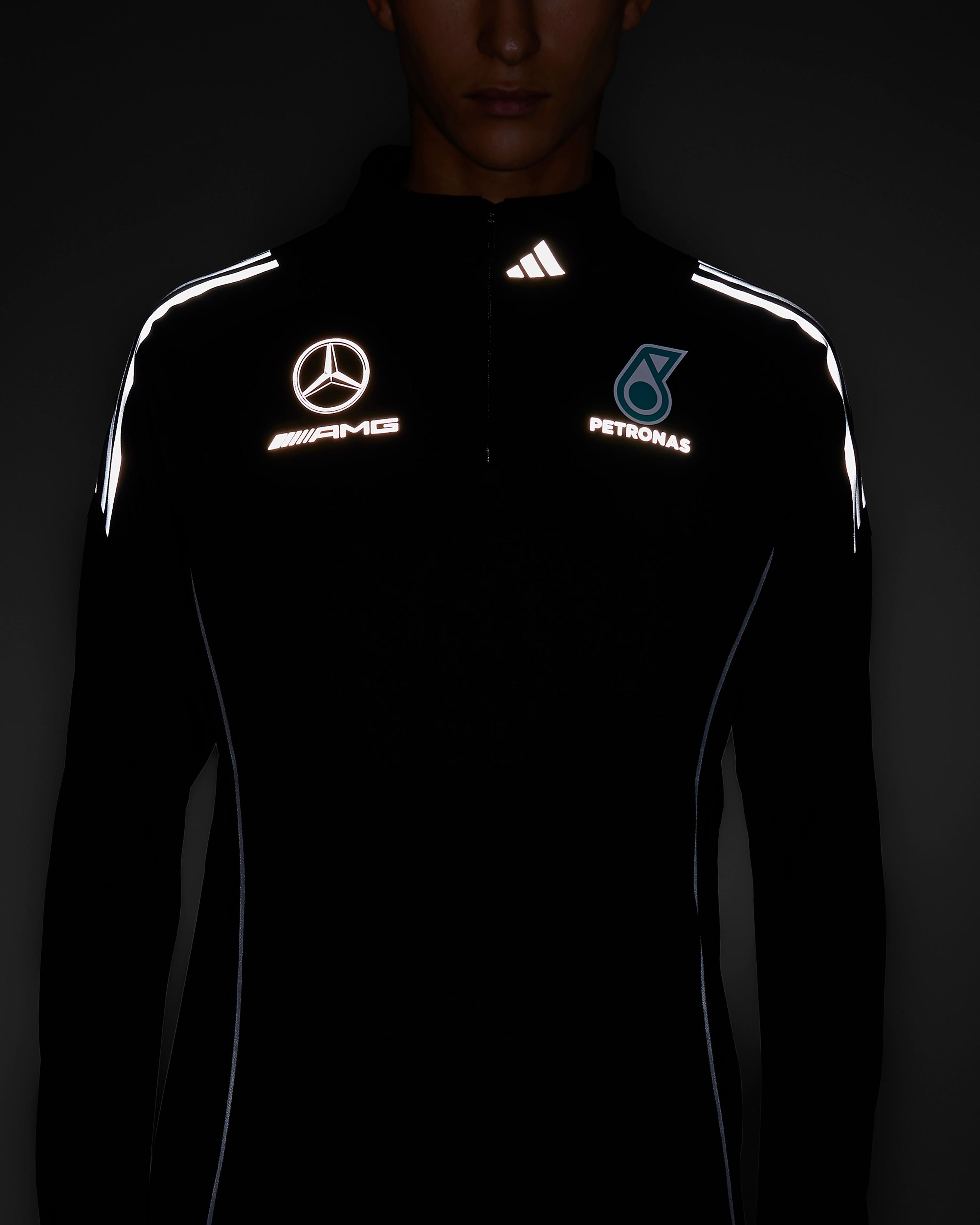 Mens 2025 Mechanics Top Black — close-up design detail showing Mercedes-AMG PETRONAS F1 styling and product details | Dash Racegear