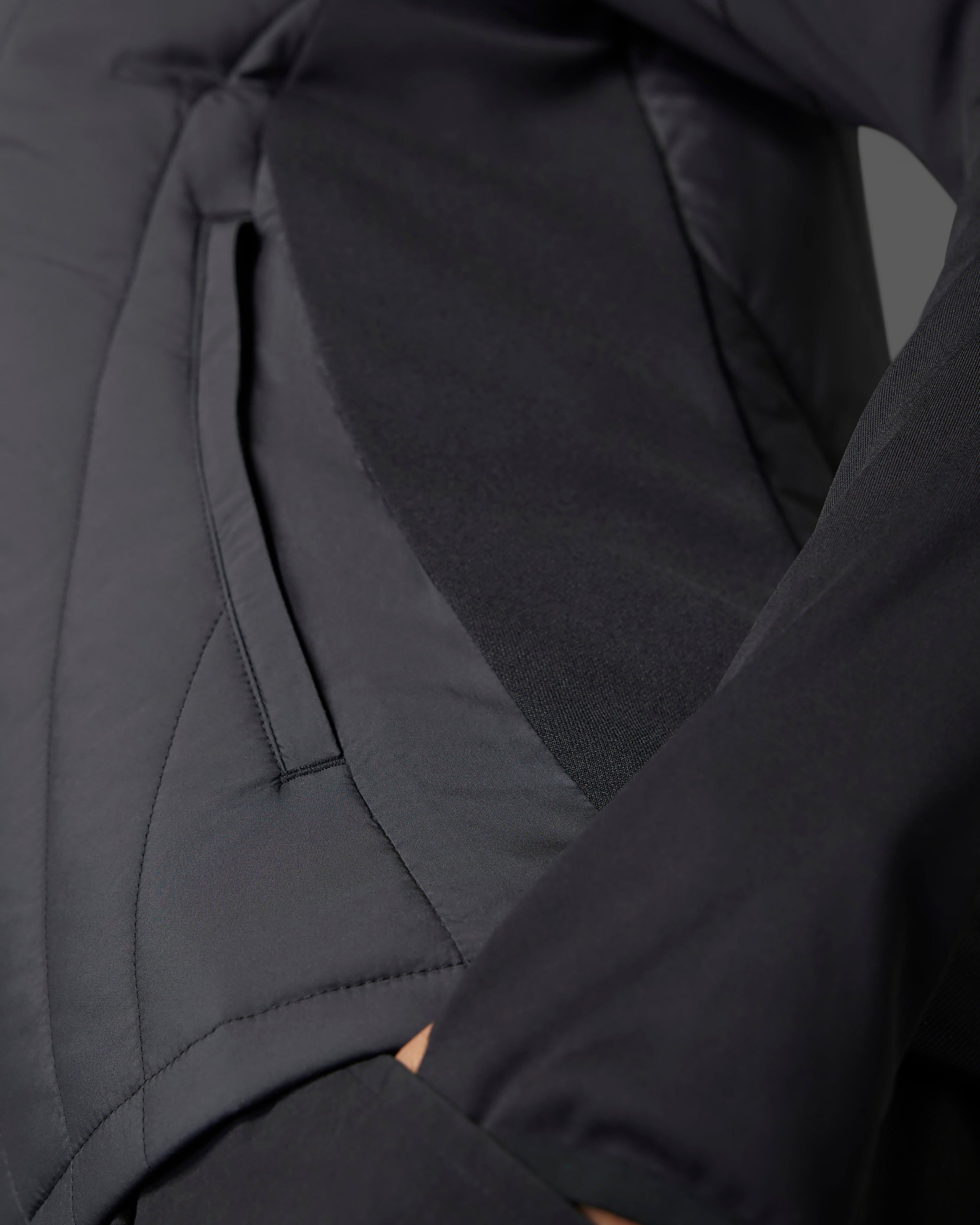 Womens 2025 Mechanics Vest Black — close-up design detail showing Mercedes-AMG PETRONAS F1 styling and product details | Dash Racegear