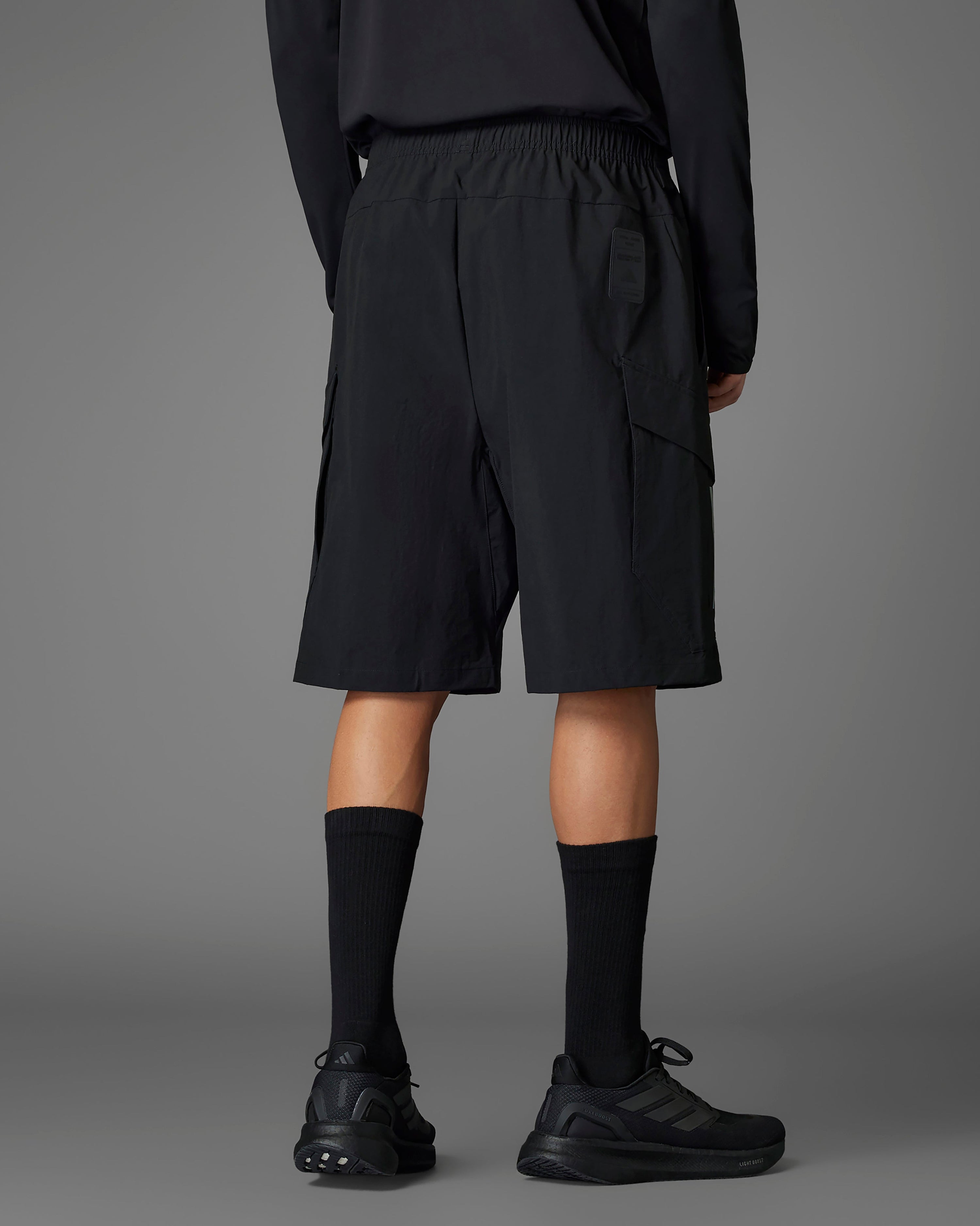 Mens 2025 Mechanics Shorts Black — alternate product angle showing Mercedes-AMG PETRONAS F1 styling and product details | Dash Racegear
