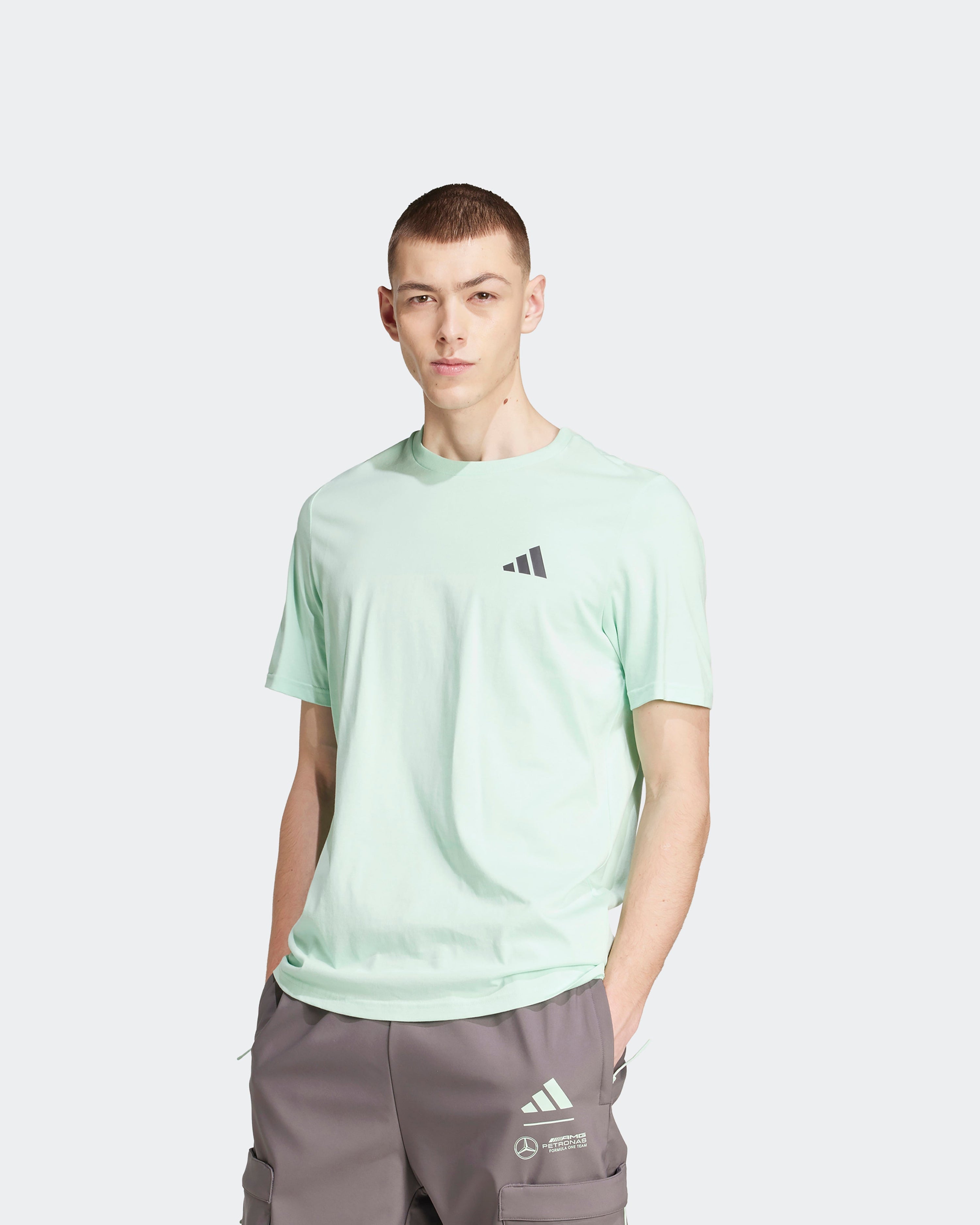 Mens Premium Woven Graphic T-Shirt Green — primary product view showing Mercedes-AMG PETRONAS F1 styling and product details | Dash Racegear