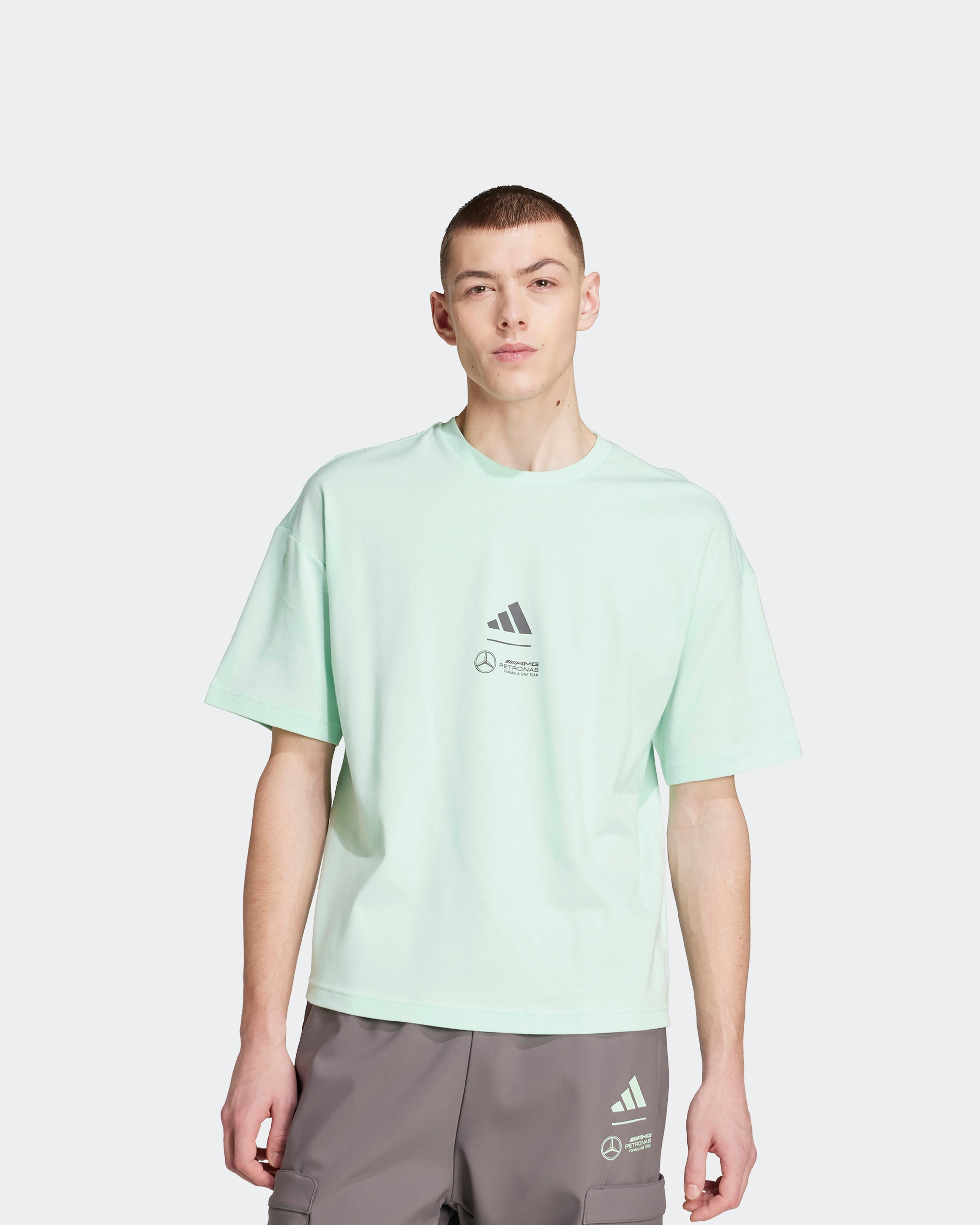 Mens Premium Woven T-Shirt Green — primary product view showing Mercedes-AMG PETRONAS F1 styling and product details | Dash Racegear