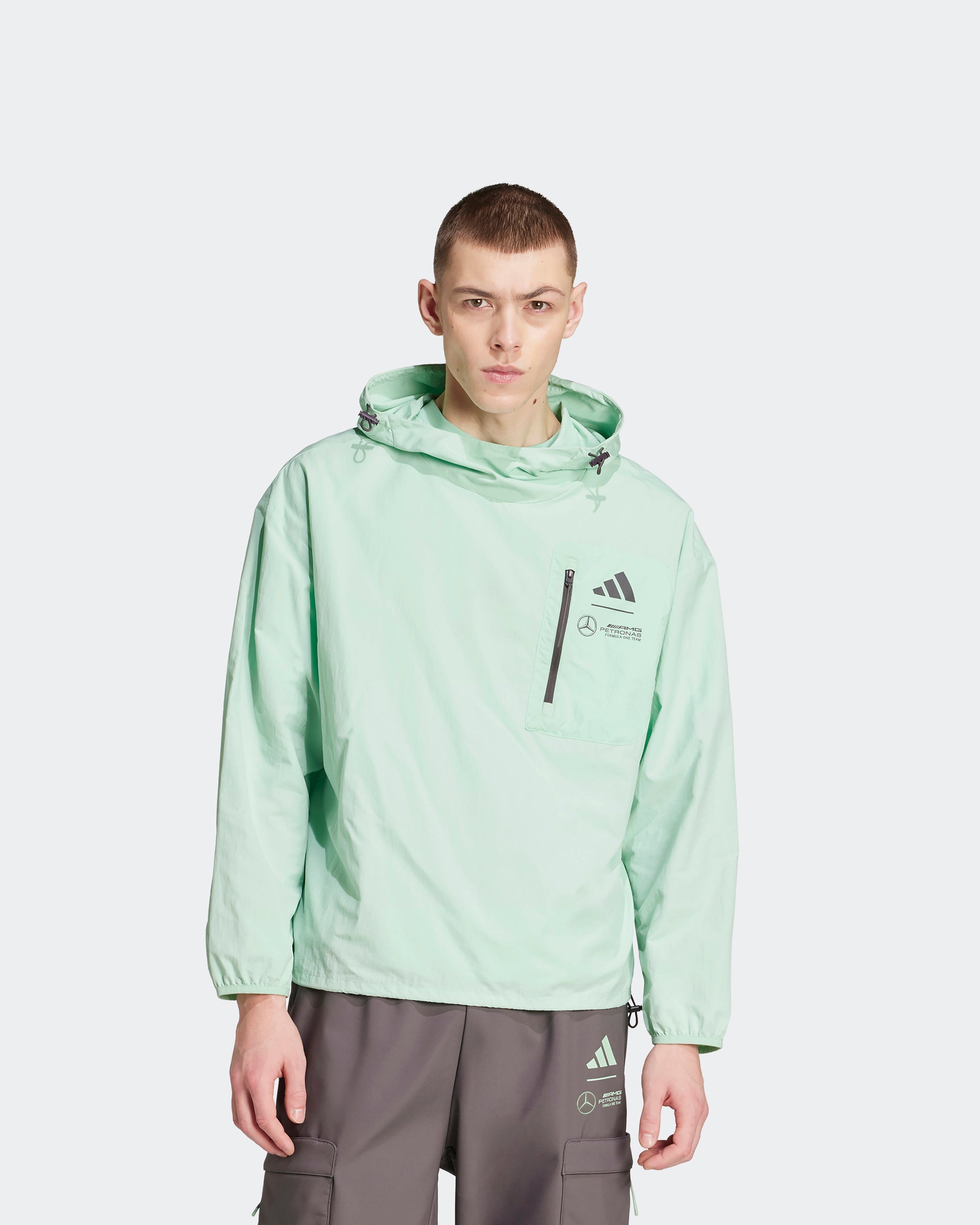 Mens Premium Woven Windbreaker Green — primary product view showing Mercedes-AMG PETRONAS F1 styling and product details | Dash Racegear