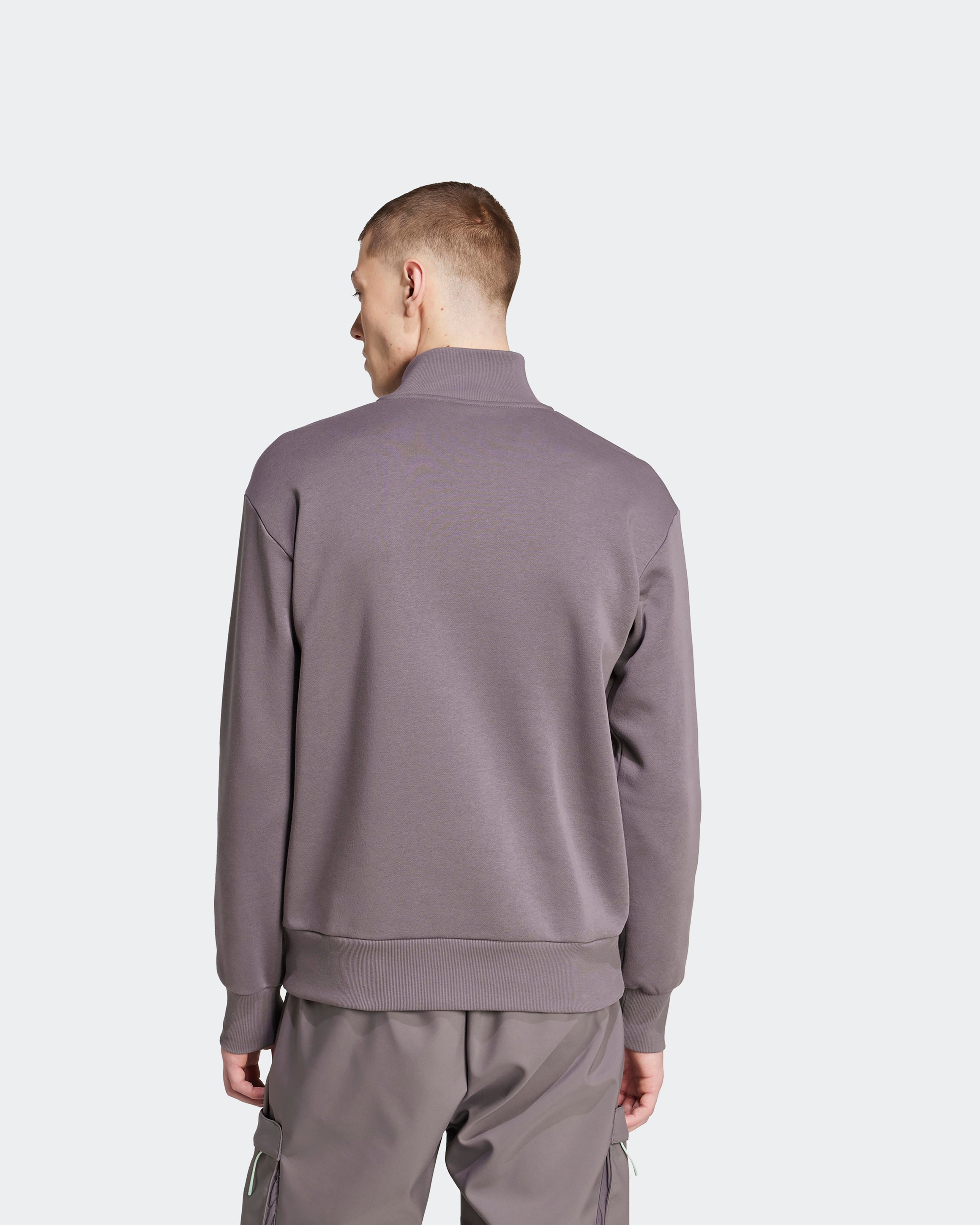 Mens Premium Woven Fleece Top Grey — close-up design detail showing Mercedes-AMG PETRONAS F1 styling and product details | Dash Racegear