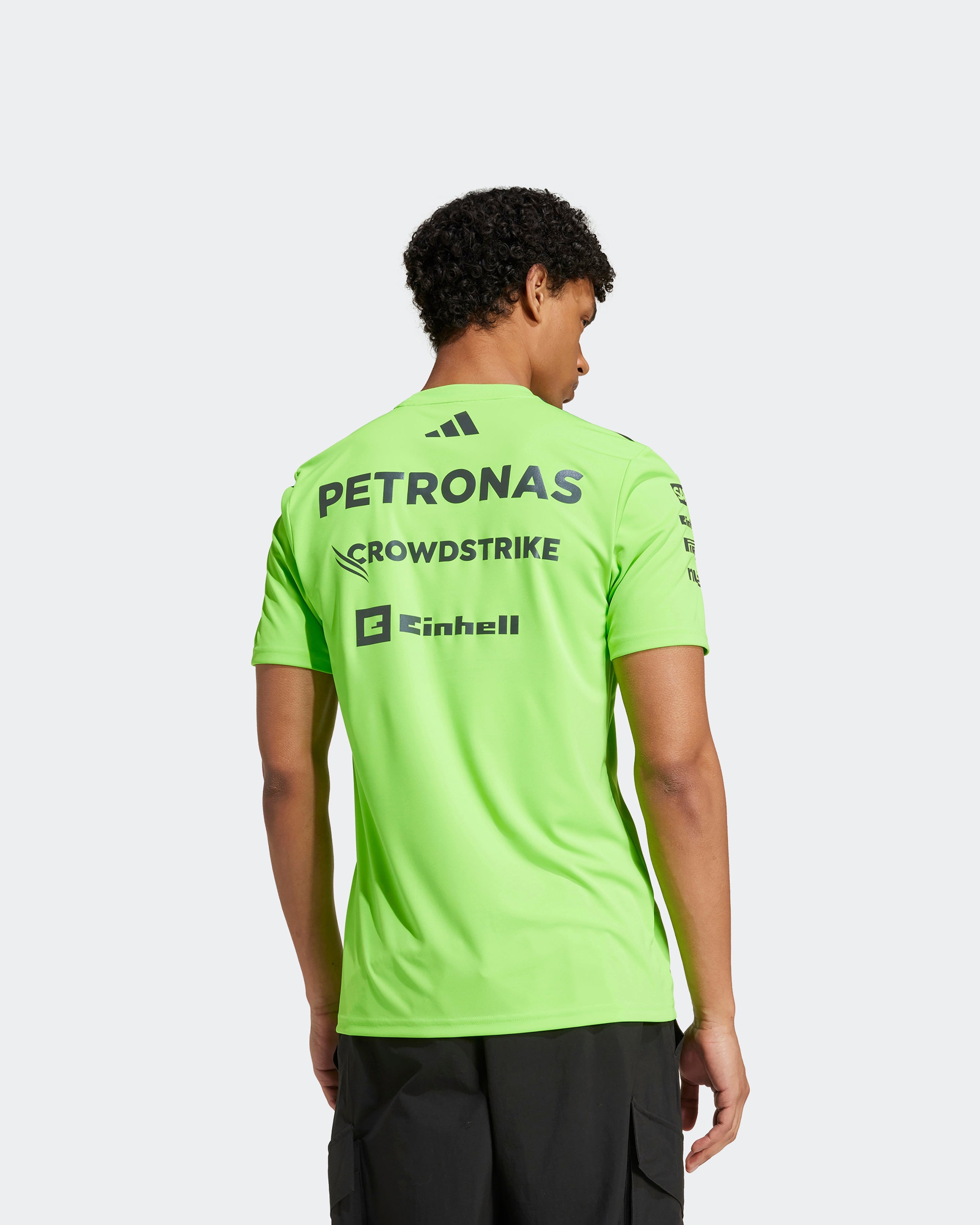 Mens 2025 Team Set Up Tee Green — close-up design detail showing Mercedes-AMG PETRONAS F1 styling and product details | Dash Racegear