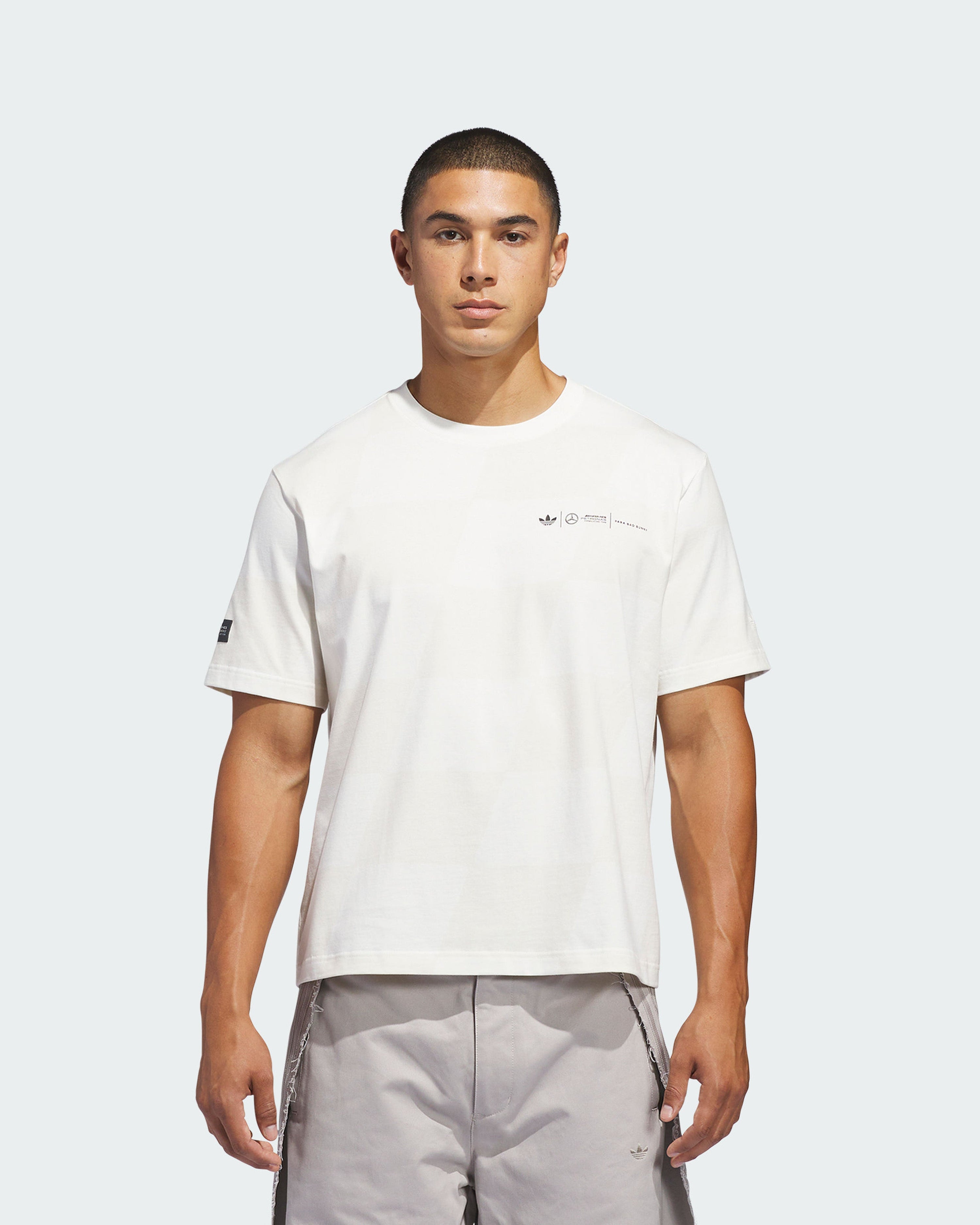 adidas para Bad Bunny x Mercedes-AMG F1 T-shirt White — close-up design detail showing Mercedes-AMG PETRONAS F1 styling and product details | Dash Racegear