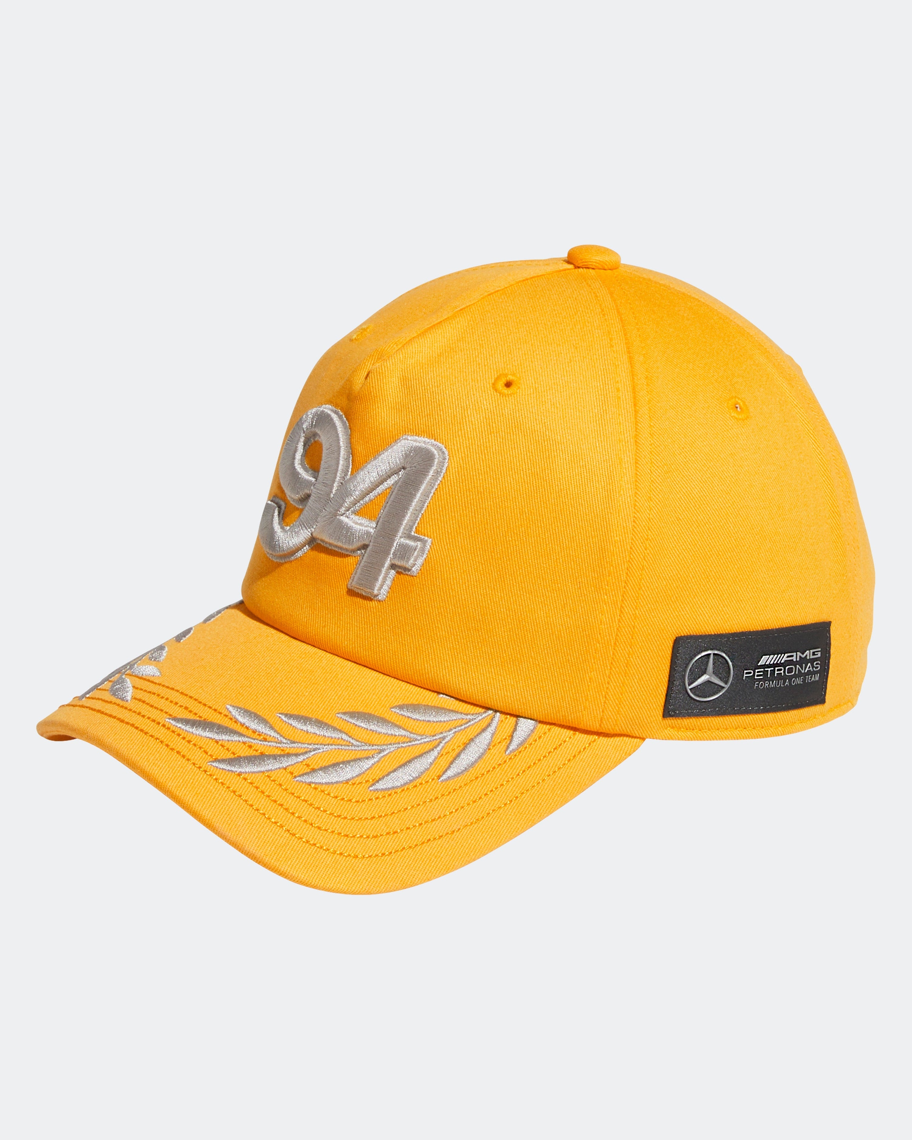 adidas para Bad Bunny x Mercedes-AMG F1 Racing Cap Gold — close-up design detail showing Mercedes-AMG PETRONAS F1 styling and product details | Dash Racegear