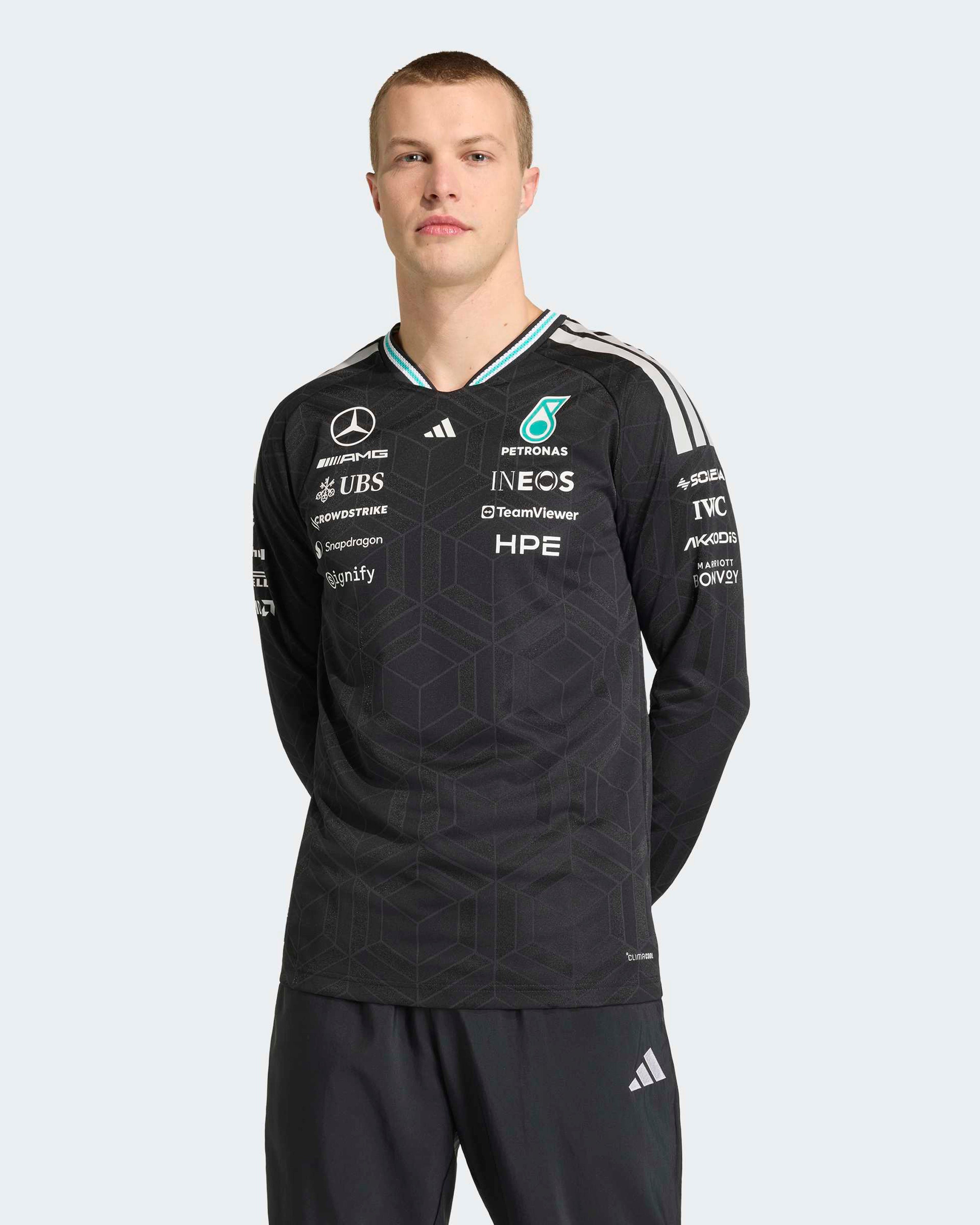 Mens 2026 Authentic Long-Sleeve Driver Tee Black — close-up design detail showing Mercedes-AMG PETRONAS F1 styling and product details | Dash Racegear