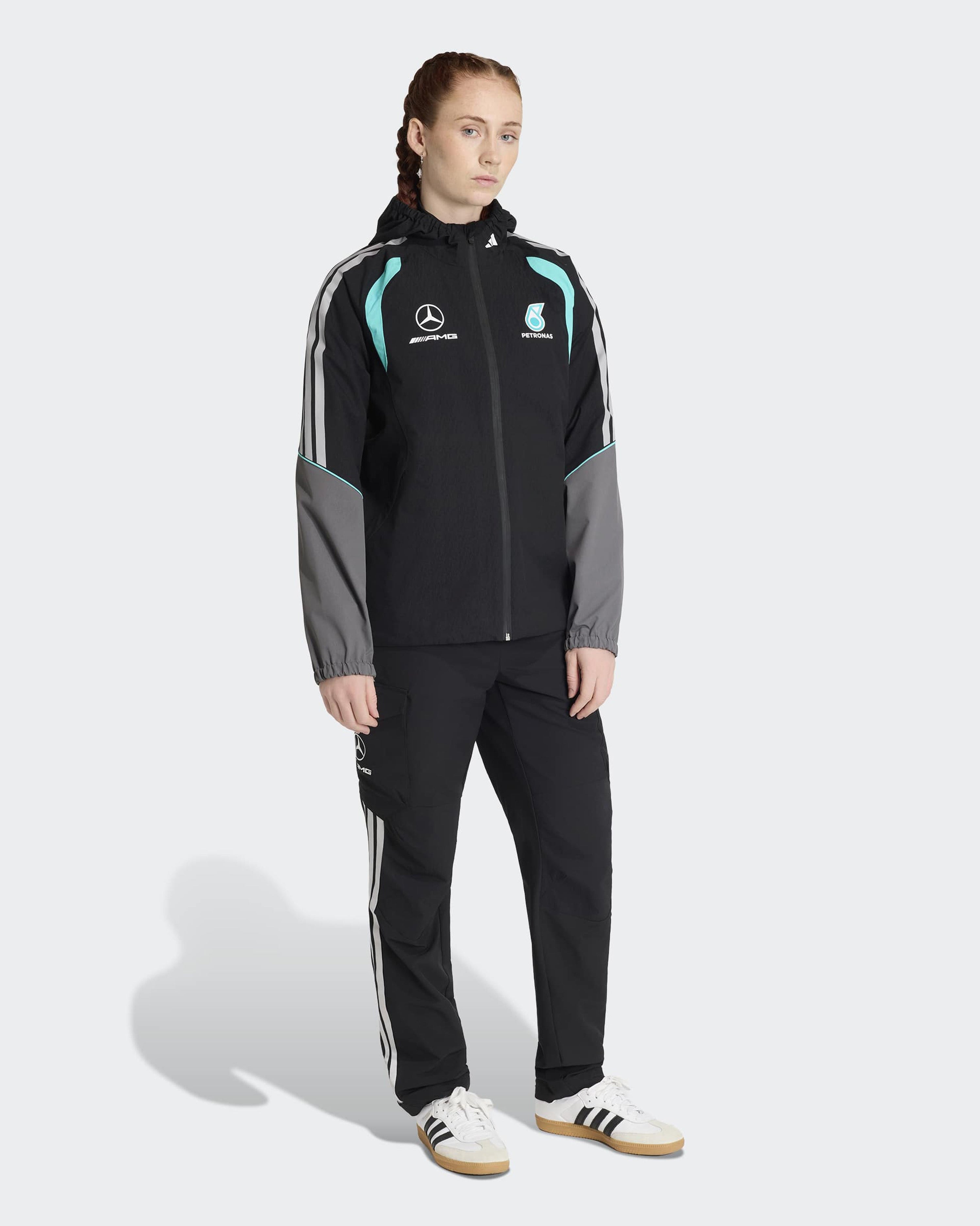 Womens 2026 Mechanics Rain Jacket Black — close-up design detail showing Mercedes-AMG PETRONAS F1 styling and product details | Dash Racegear
