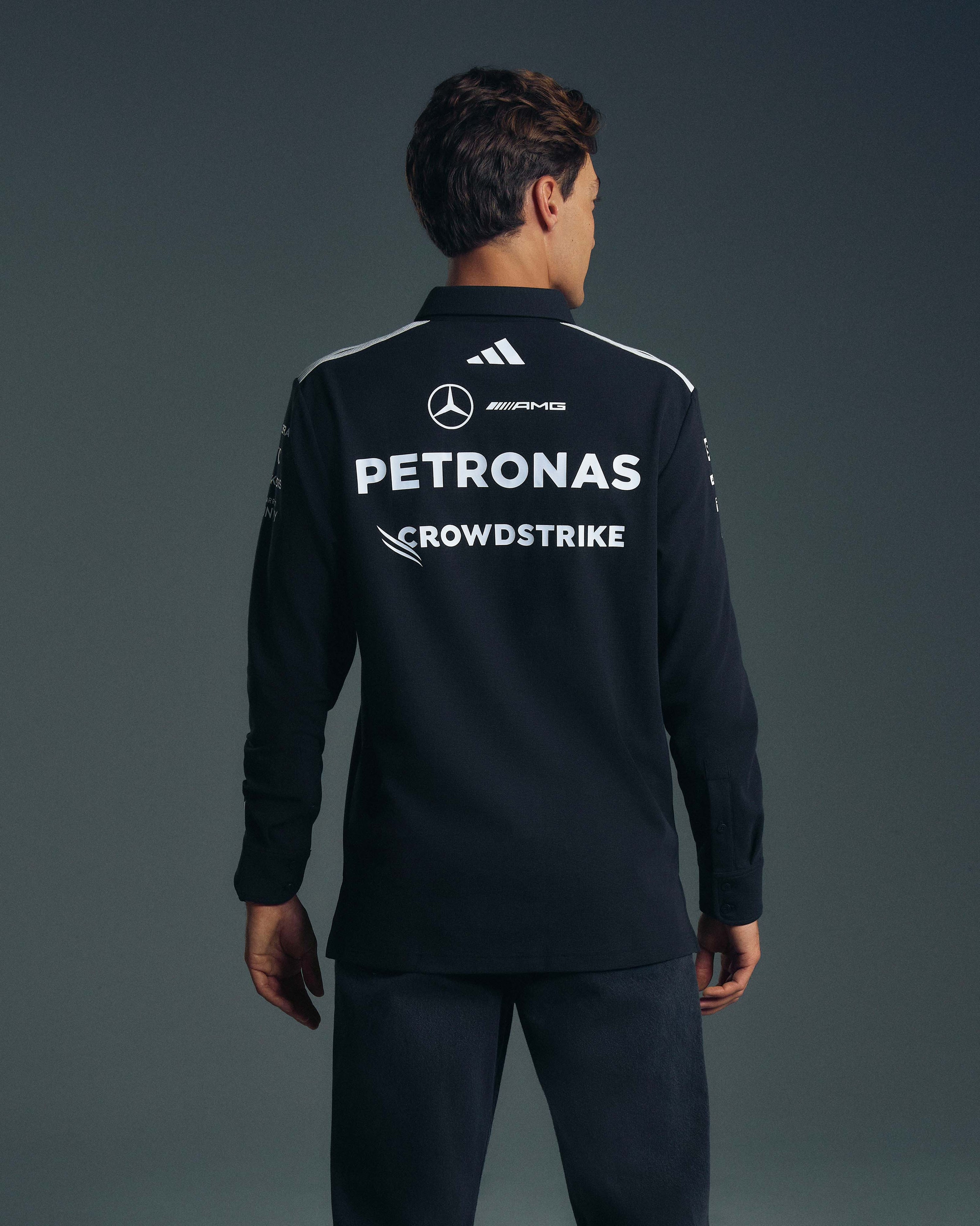 Mens 2026 Team Long-Sleeve Polo Black — alternate product angle showing Mercedes-AMG PETRONAS F1 styling and product details | Dash Racegear