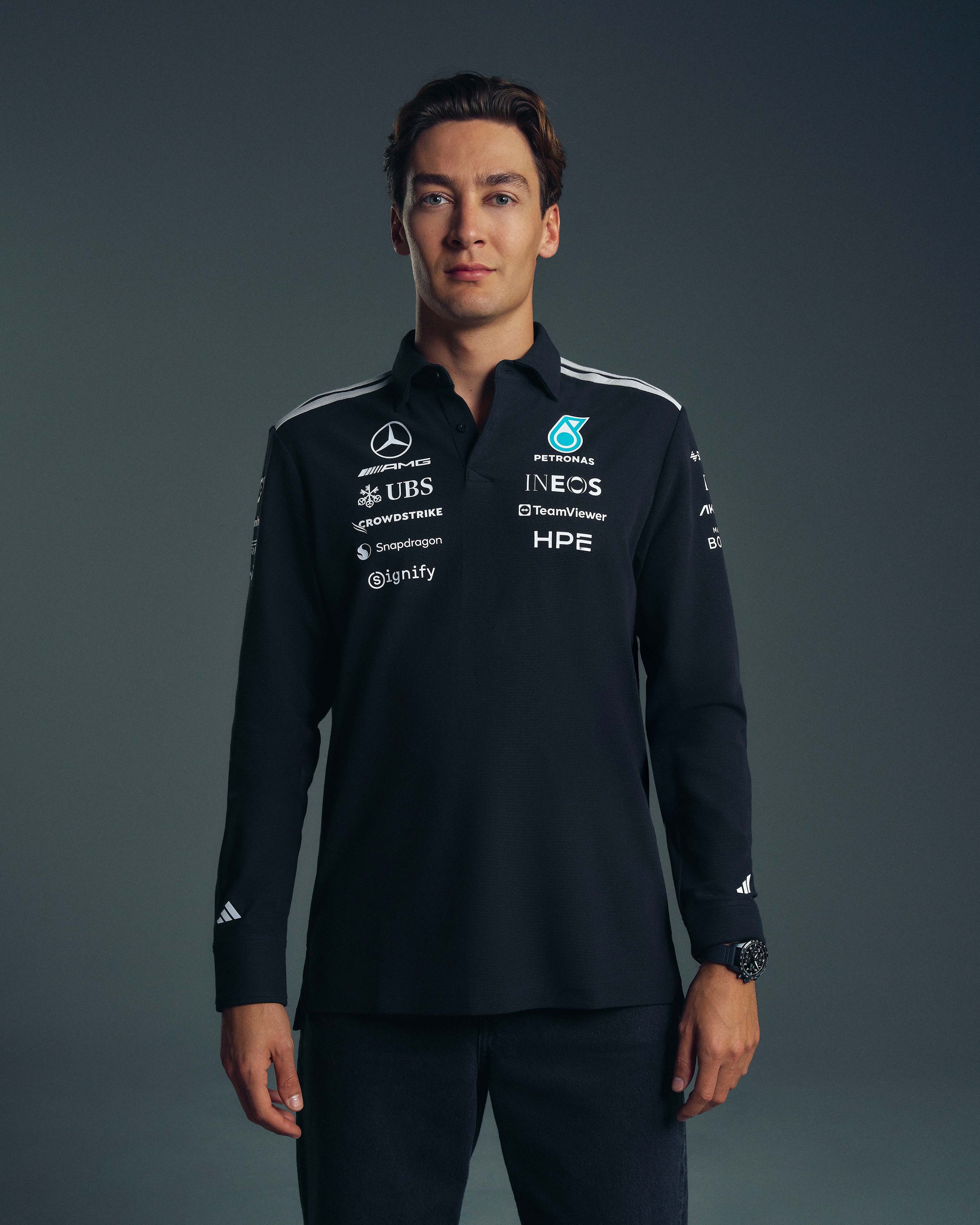 Mens 2026 Team Long-Sleeve Polo Black — primary product view showing Mercedes-AMG PETRONAS F1 styling and product details | Dash Racegear