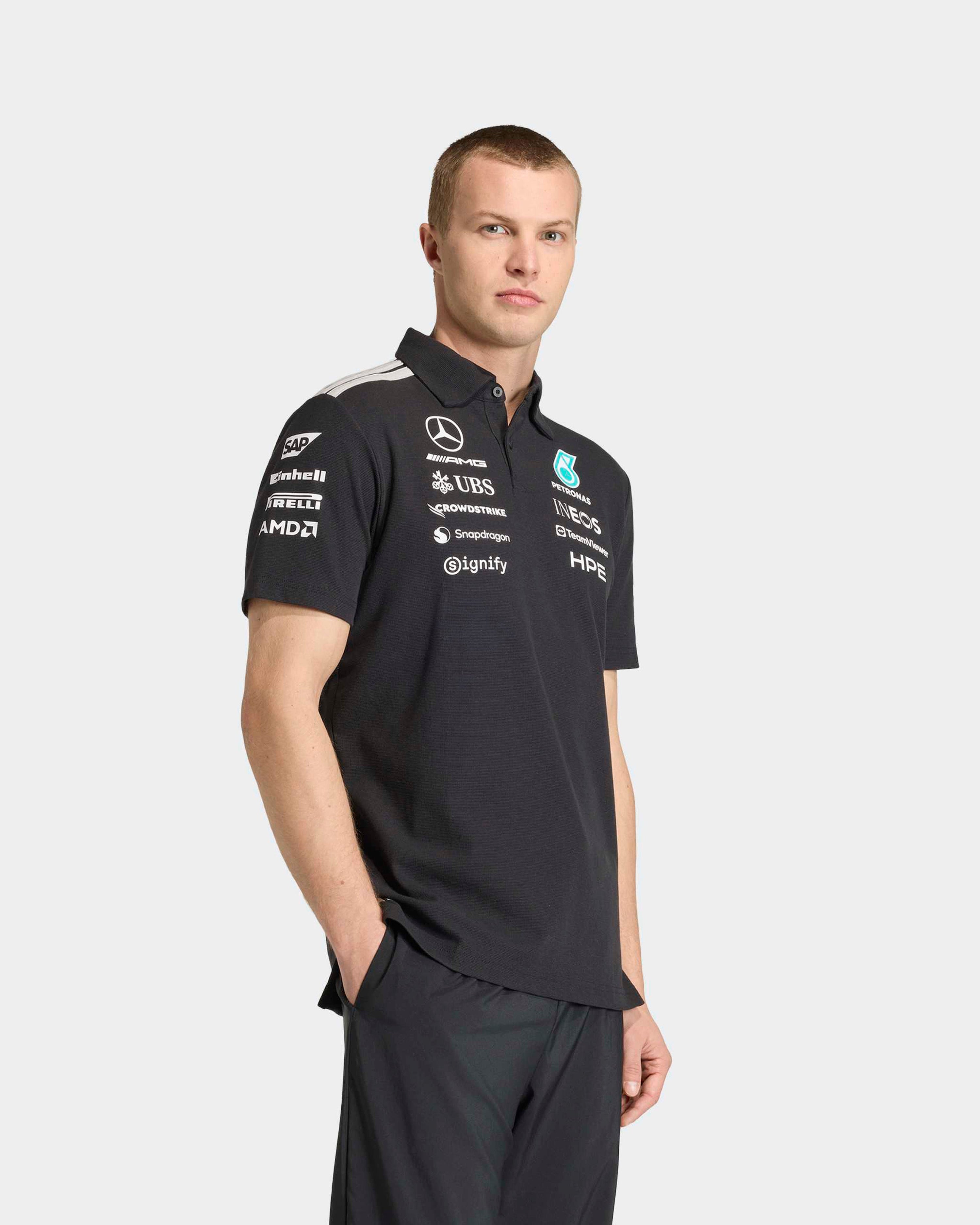 Mens 2026 Team Polo Black — primary product view showing Mercedes-AMG PETRONAS F1 styling and product details | Dash Racegear