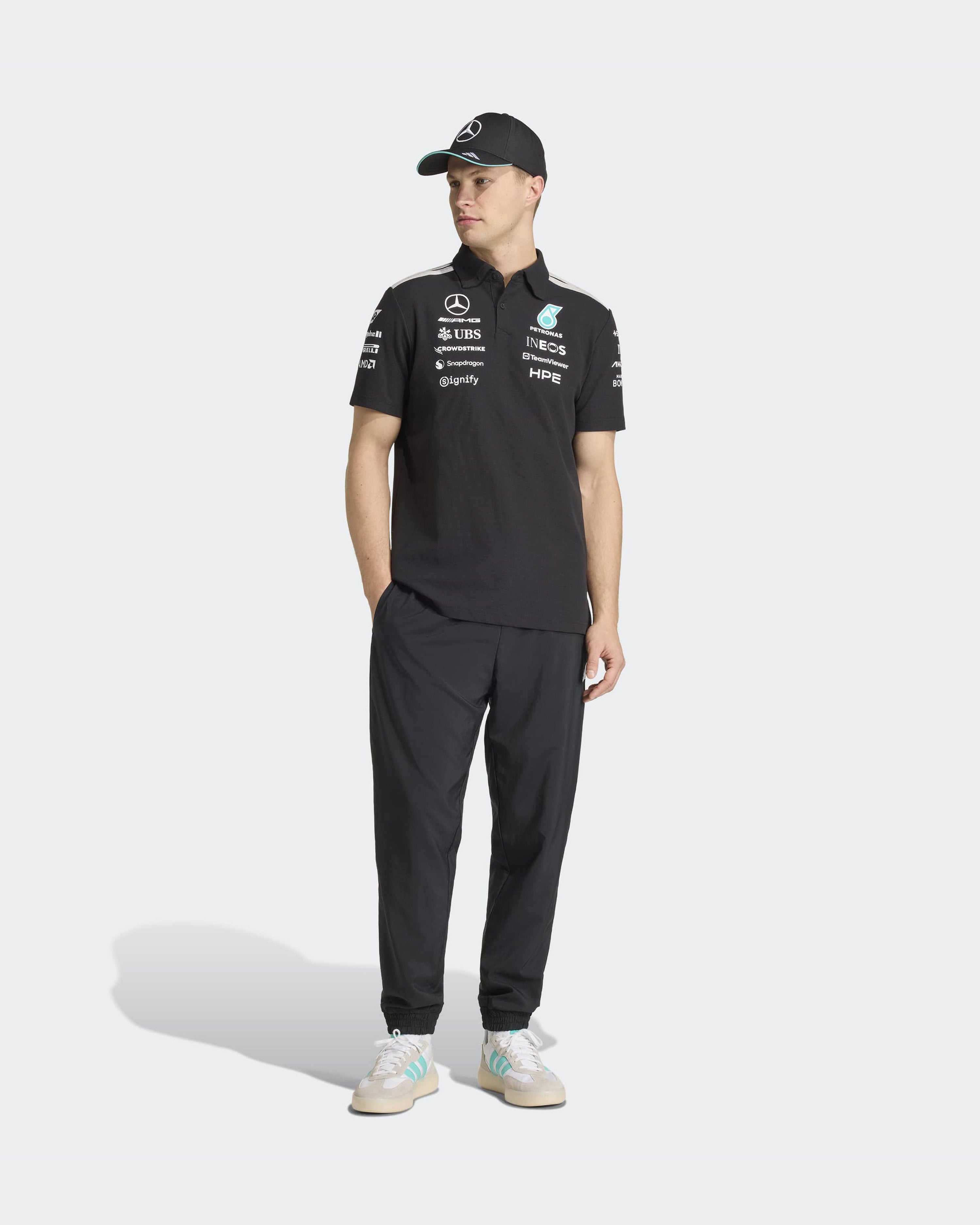 Mens 2026 Team Polo Black — close-up design detail showing Mercedes-AMG PETRONAS F1 styling and product details | Dash Racegear