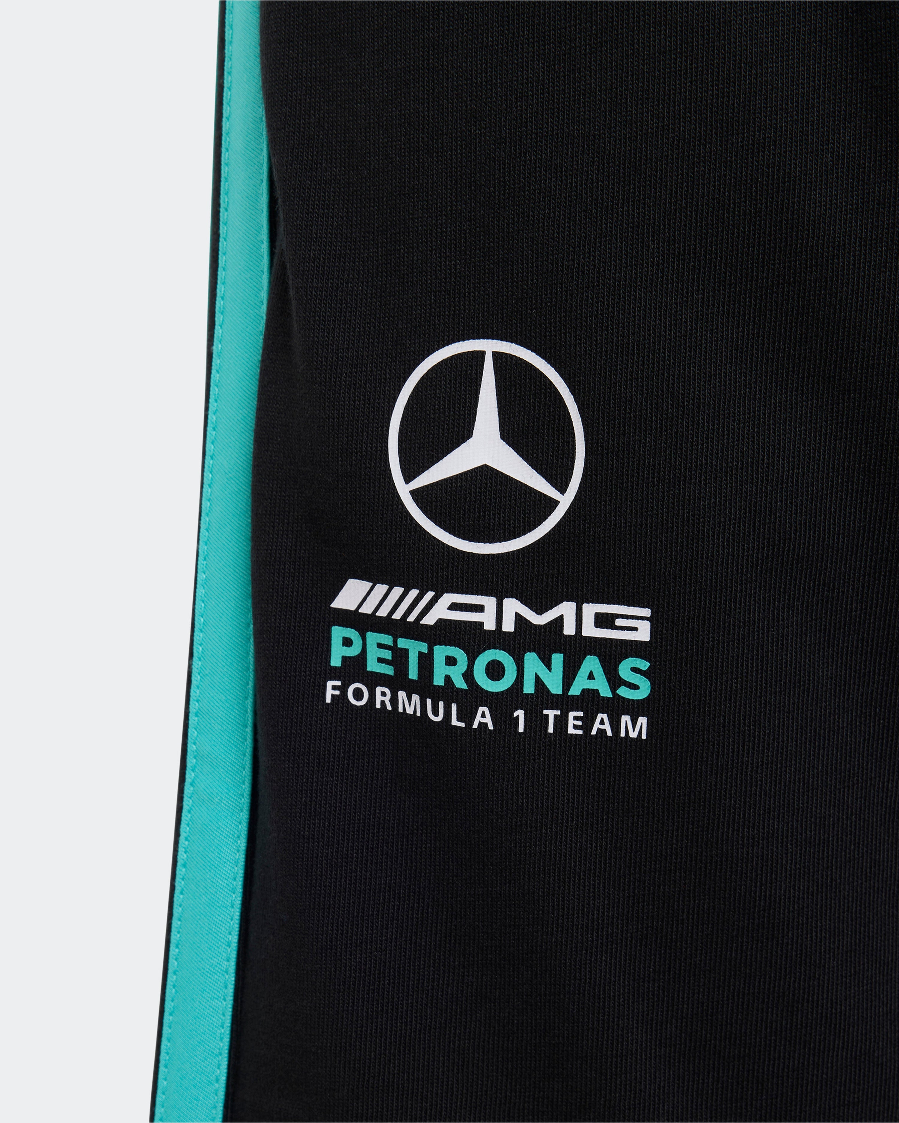 Kids DNA Shorts Black — close-up design detail showing Mercedes-AMG PETRONAS F1 styling and product details | Dash Racegear