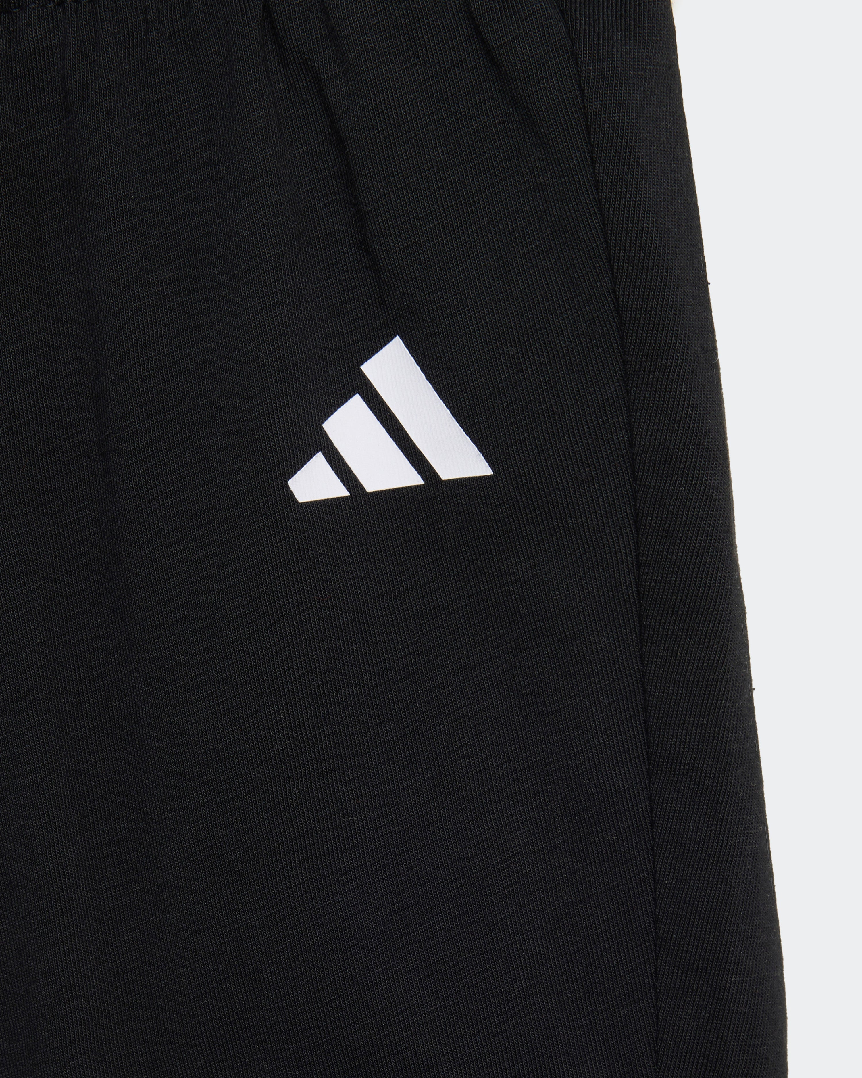 Kids DNA Short-Sleeve Pants Black — close-up design detail showing Mercedes-AMG PETRONAS F1 styling and product details | Dash Racegear
